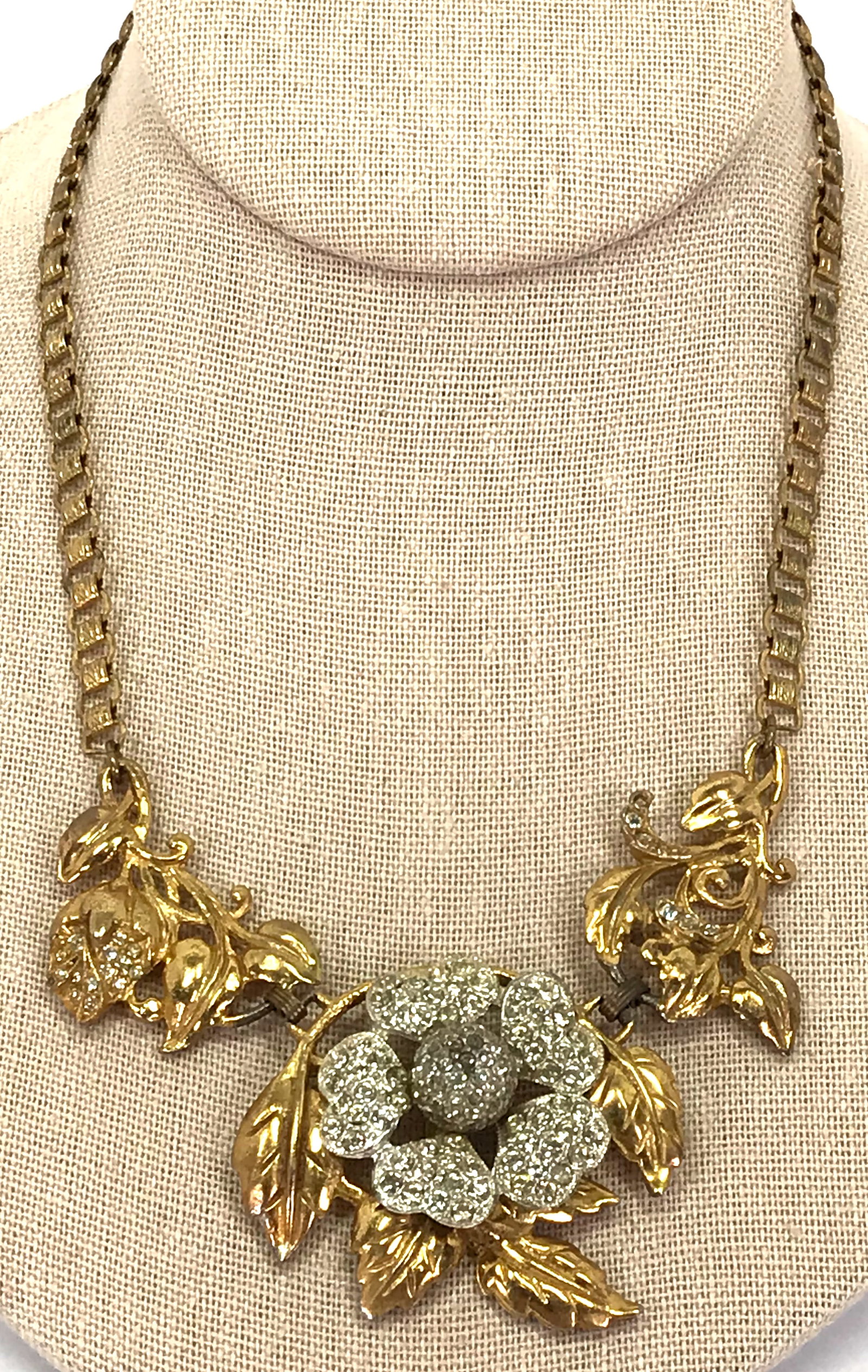 Antique art deco rhinestones flowers medallion book chain necklace: Antique art deco clear rhinestones flowers & leaves medallion with book chain strap silvertone and goldtone metal collar necklace . For measures please refer to the picture taken with a measuring tape