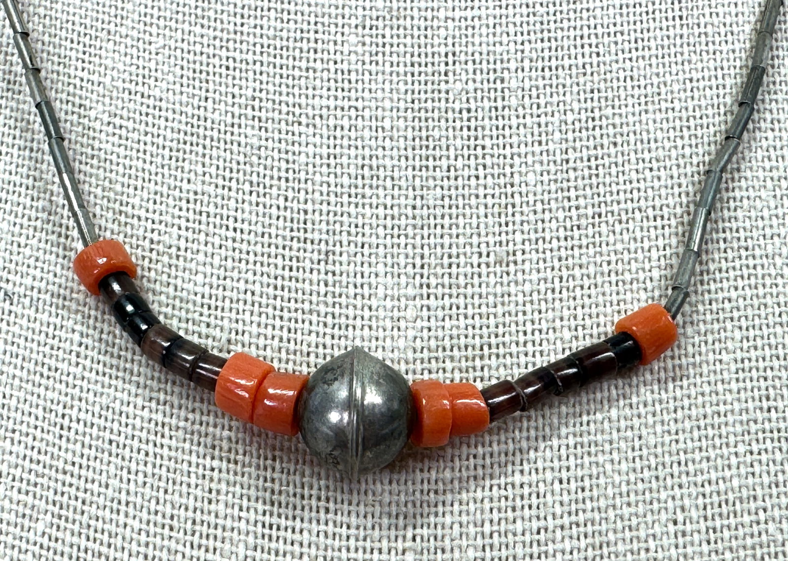 Vintage native american orange spiny oyster heishi & liquid silver choker necklace: Vintage native american orange spiny oyster heishi & liquid silver choker necklace For measures please refer to the pictures taken with a measuring tape. Weight: 6 Grams. This is a NO RESERVE AUCTION: