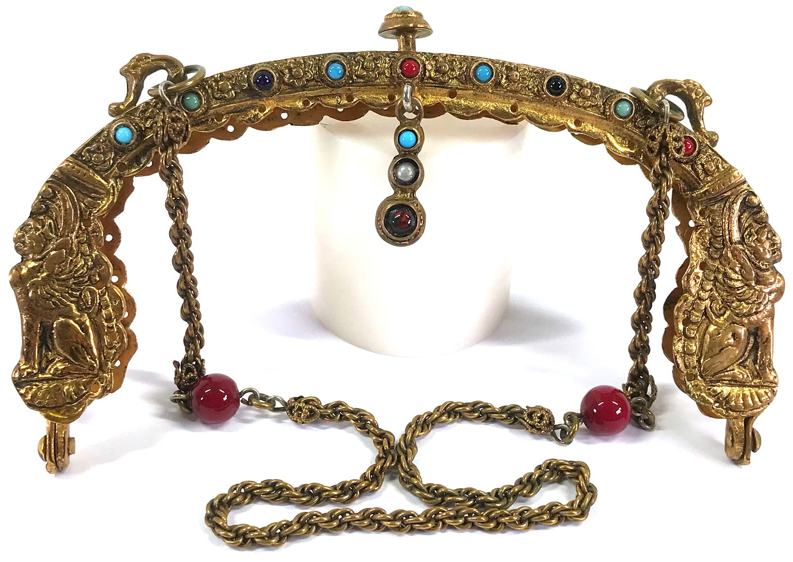 Antique etruscan revival jeweled chimera golden purse frame: Antique 1920"s etruscan revival jeweled chimera goldtone metal purse frame. Jeweled Pull ring and chain strap. For measures please refer to the pictures taken with a measure tape. Weight: 106 Grams. T
