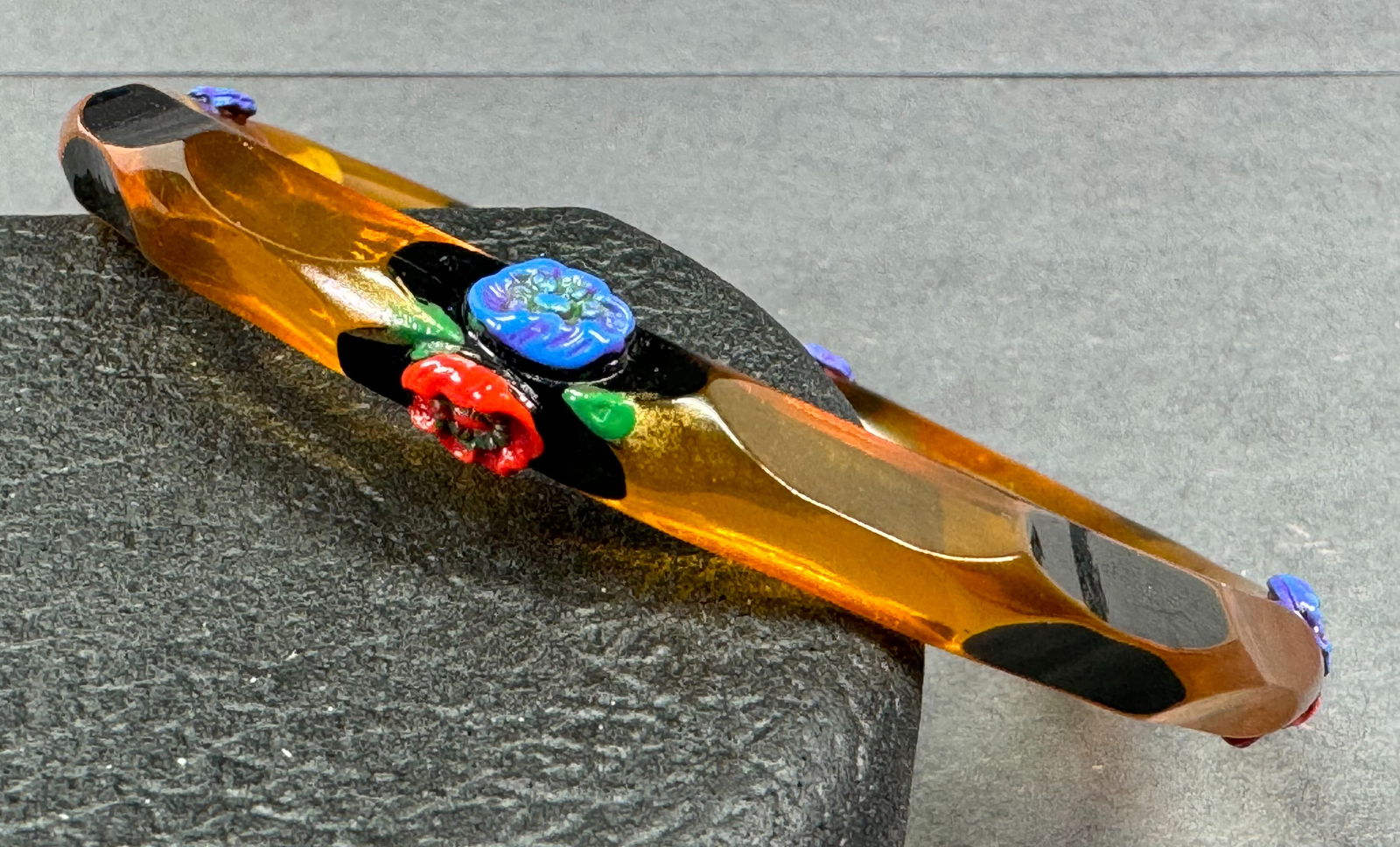Vintage applied red & blue molded glass flowers black enamel applejuice celluloid bracelet bangle. (1 of 11)