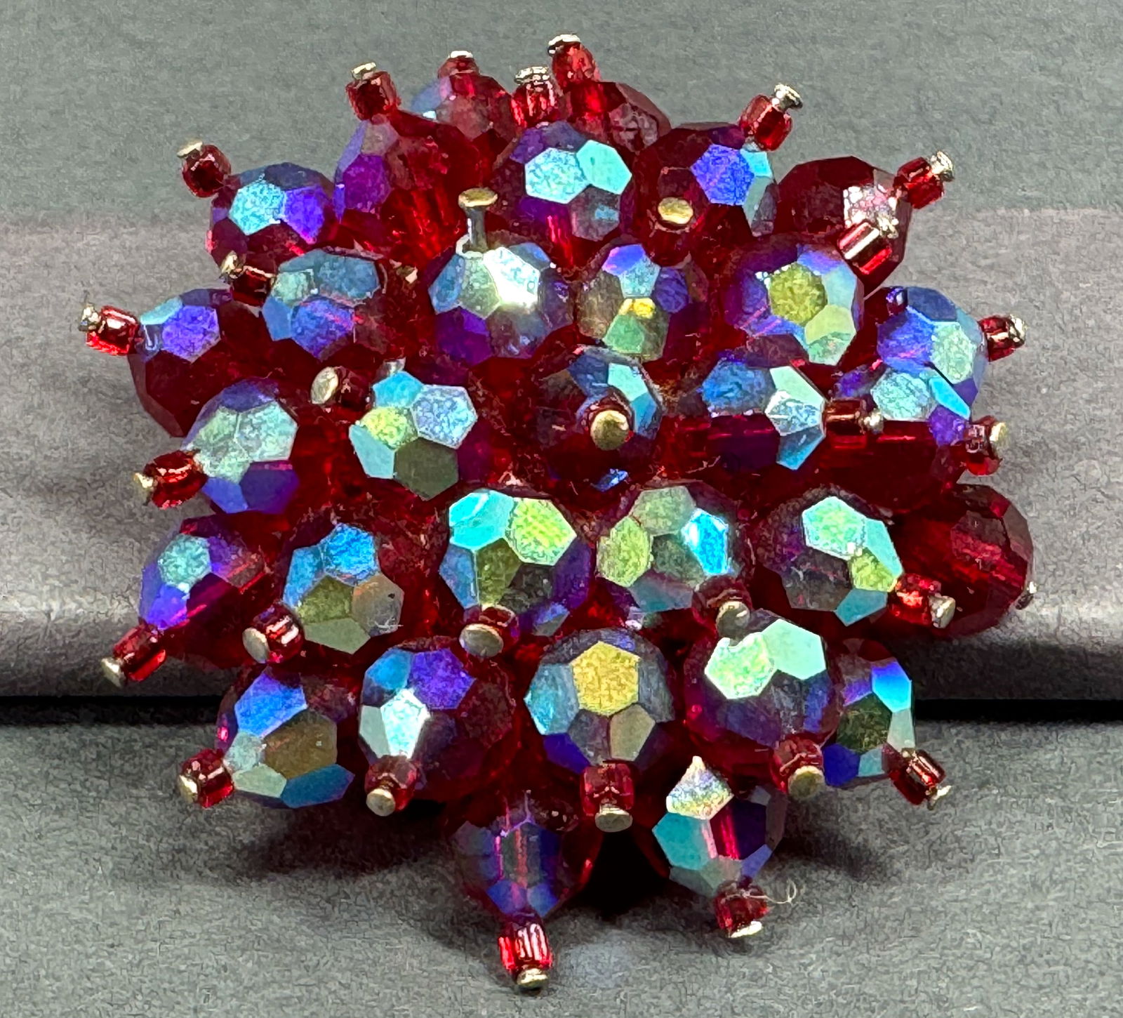 Vintage AB reddish crystal beads silvertone metal rounded dome flower pin brooch.: Vintage AB reddish crystal beads silvertone metal rounded dome flower pin brooch. Unmarked. For measures please refer to the pictures taken with a measuring tape. Weight: 25 Grams. This is a NO RESERV