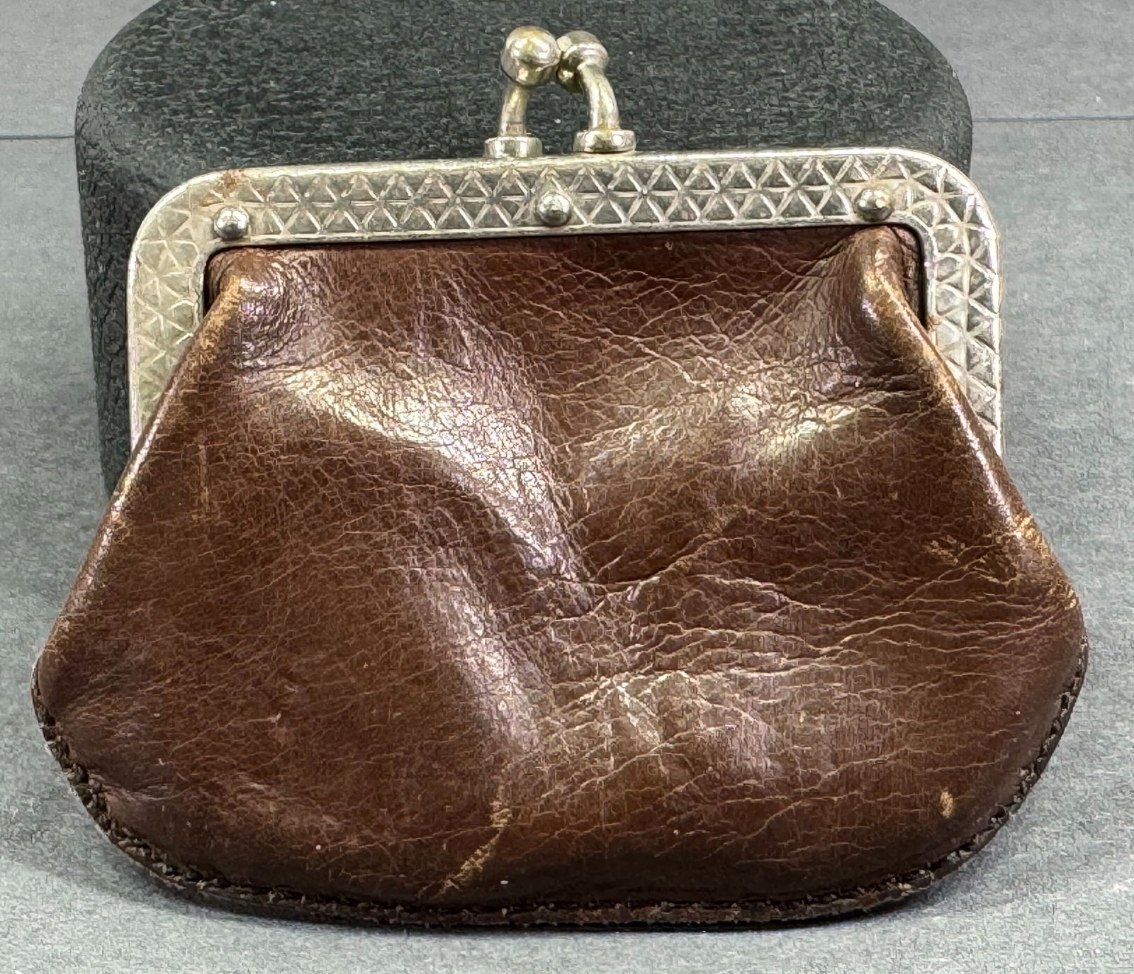 Antique decorated silvertone metal frame genuine leather coin purse. (1 of 9)