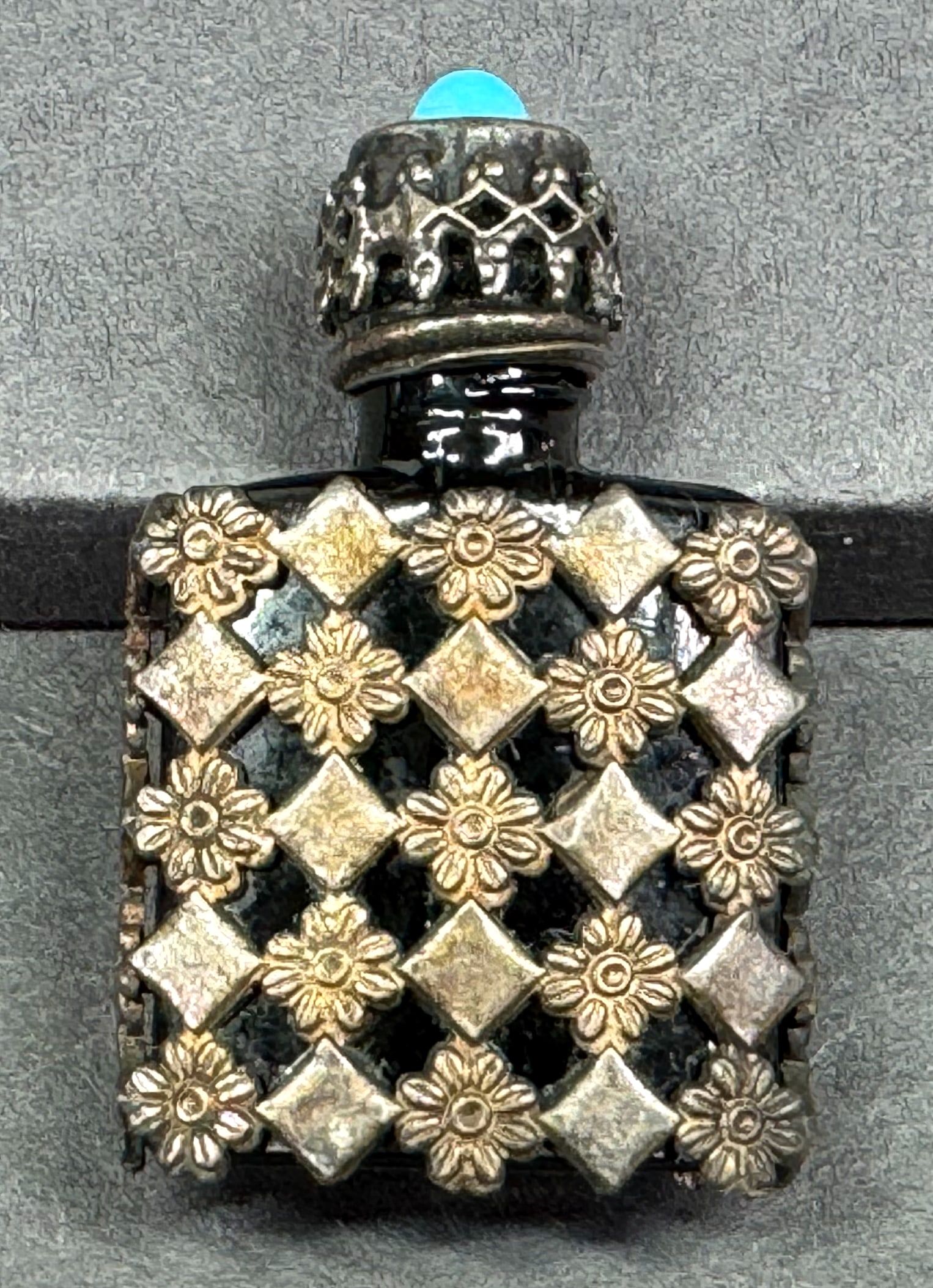 Vintage French blue glass lined in metal jeweled cap with dauber miniature perfume bottle.: Vintage French blue glass lined in metal jeweled cap with dauber miniature perfume bottle. Empty. Bottom glass is molded Made in France. For measures please refer to the pictures taken with a measurin