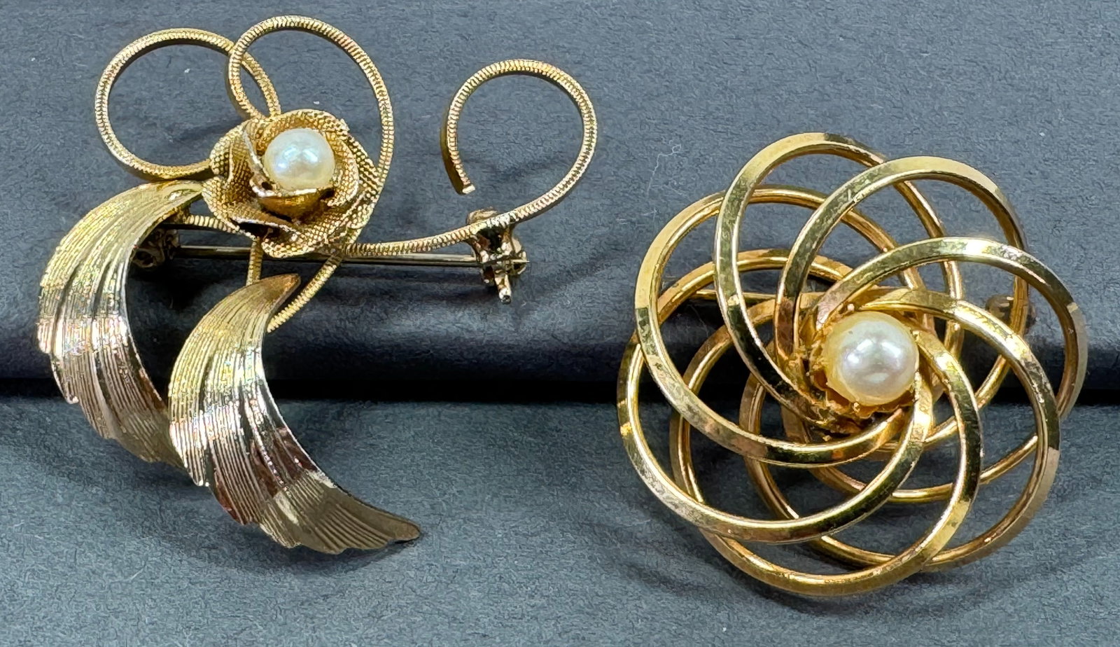 Vintage Henry Griffith cultured pearl gold filled flower & other pin brooches.: Vintage Henry Griffith cultured pearl gold filled flower & faux pearl goldtone metal flower and leaves pin brooches. The woven flower is marked 1/20 12K GF HG and the other one is unmarked. For measur