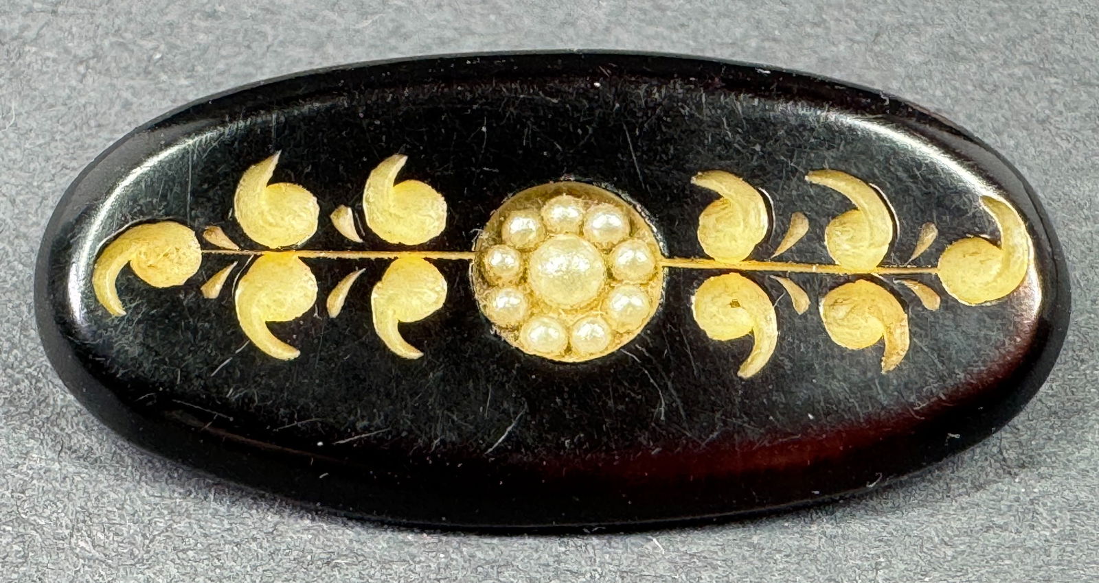 Antique pearly beaded flower carved leaves black celluloid oval pin. (1 of 7)