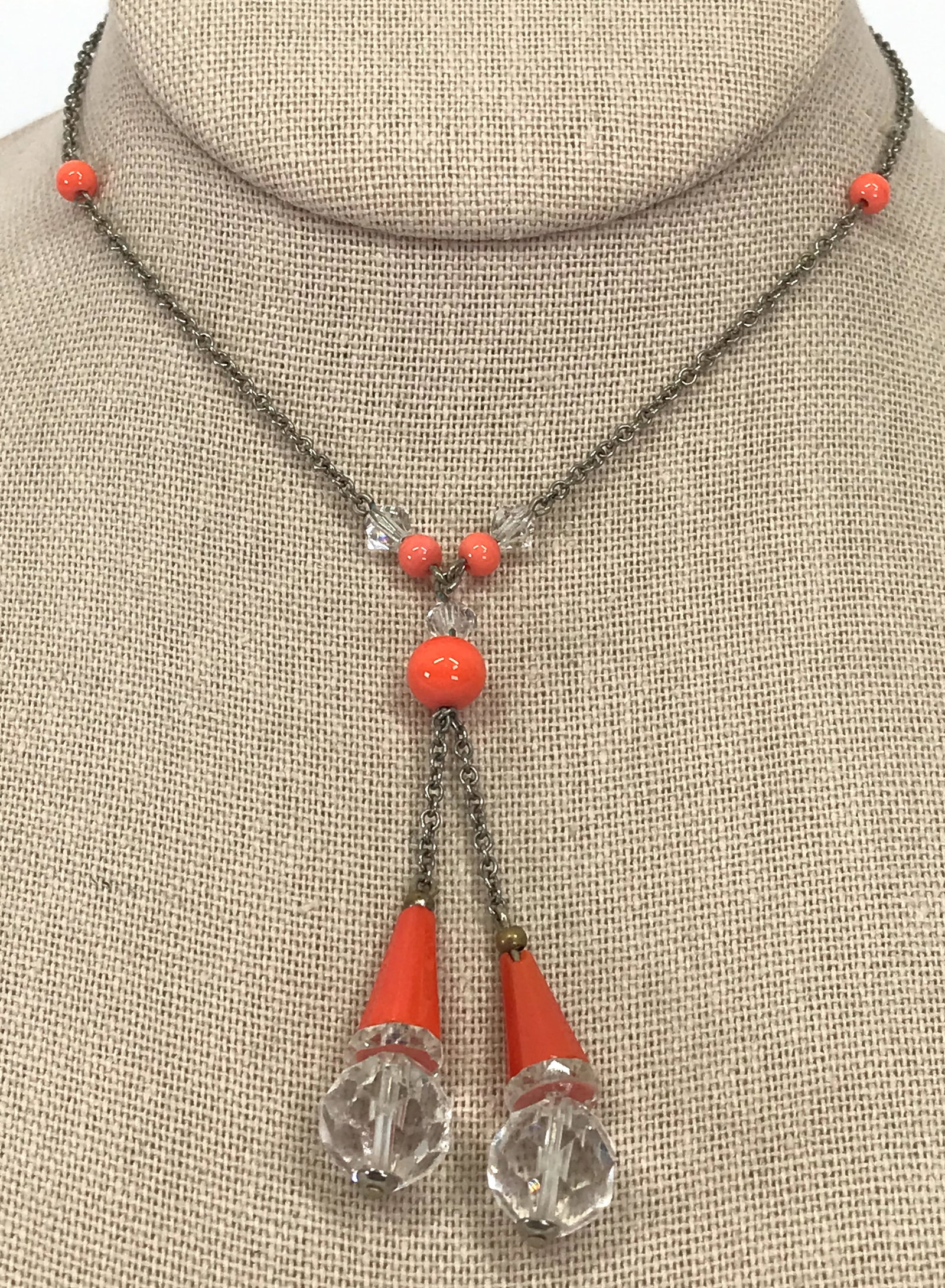 Antique art deco coral crystals silvertone chain lavalier necklace: Antique art deco faceted clear & coral crystal beads & dangles silvertone metal chain strap lavalier necklace. Unmarked. For measures please refer to the picture taken with ameasuring tape. Weight: 10