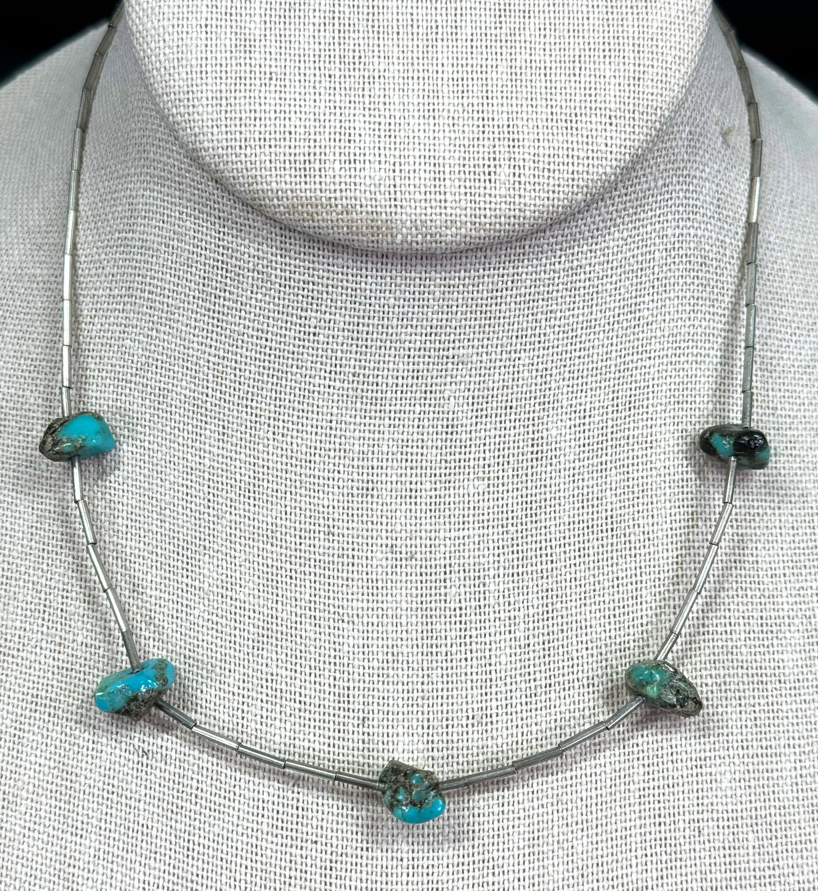 Vintage native american turquoise nuggets and liquid silver beaded choker necklace.: Vintage native american turquoise nuggets and liquid silver beaded choker necklace. Unmarked. For measures please refer to the pictures taken with a measuring tape. It measures around 15 1/4 inches lo