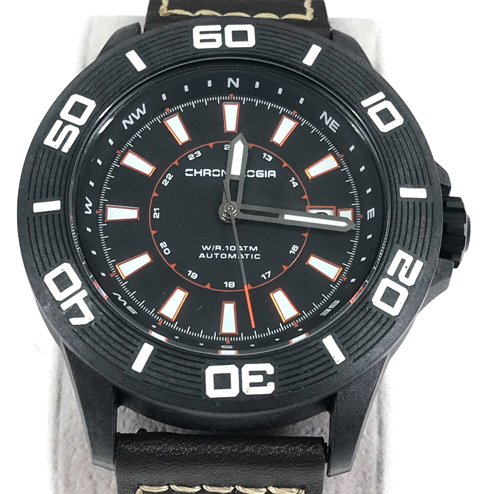 Unworn Chronologia Trekker Automatic Watch.: Unworn Chronologia Trekker Automatic Watch. Seiko NH35 Automatic Movement. Carbon Fiber Case. Sapphire coated crystal. Unidirectional rotating bezel. See through case back. Original Leather Strap. Car