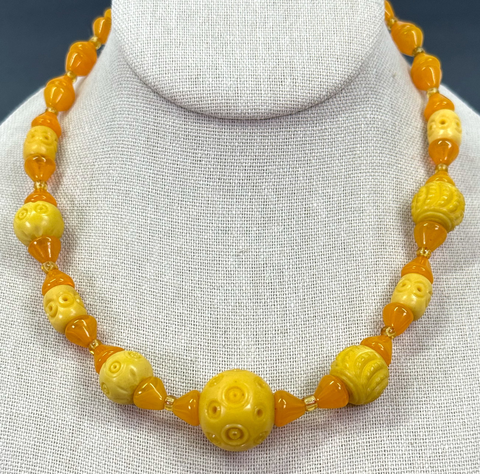 Antique art deco applejuice & butterscotch plastic & glass beaded collar necklace.: Antique art deco applejuice & butterscotch plastic & glass beaded collar necklace. For measures please refer to the pictures taken with a measuring tape. Weight: 16 Grams. This is a NO RESERVE AUCTION