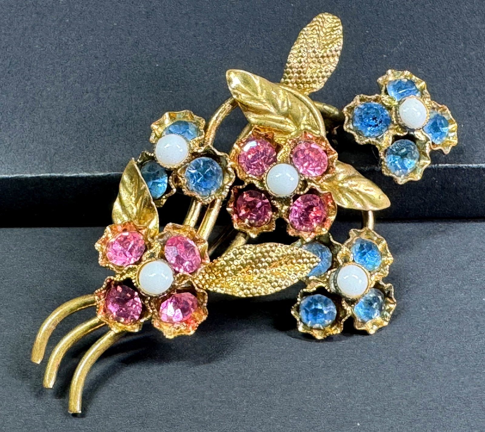 Vintage Czech milky glass cab & crystals goldtone metal flowers & leaves pin brooch. Marked.: Vintage Czech milky glass cab & crystals goldtone metal flowers & leaves pin brooch. Marked. For measures please refer to the pictures taken with a measuring tape. Weight: 9 Grams. This is a NO RESERV