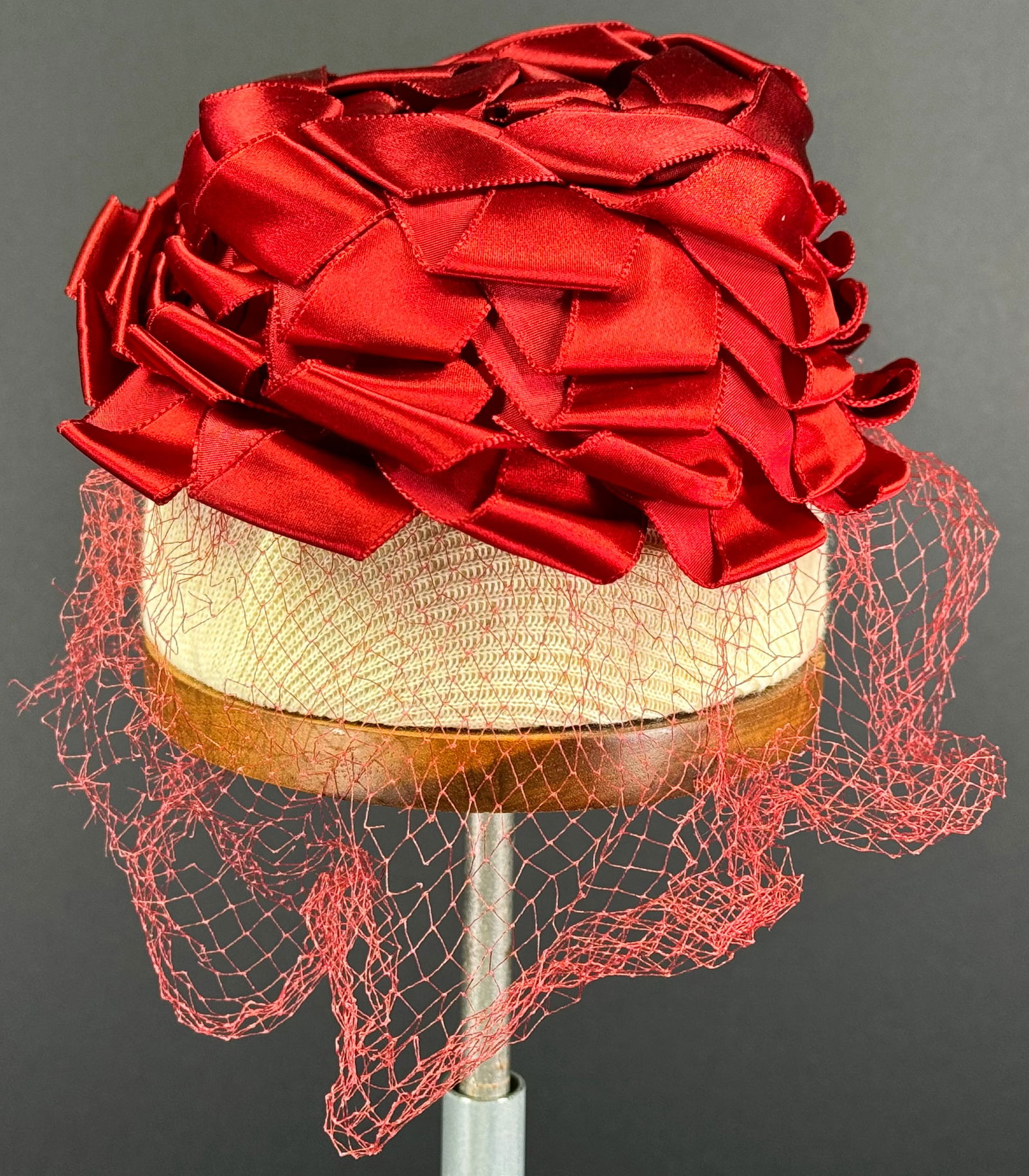 Vintage Miss Sally Victor New York ruby red silky ribbon work flower shaped hat with net (1 of 9)