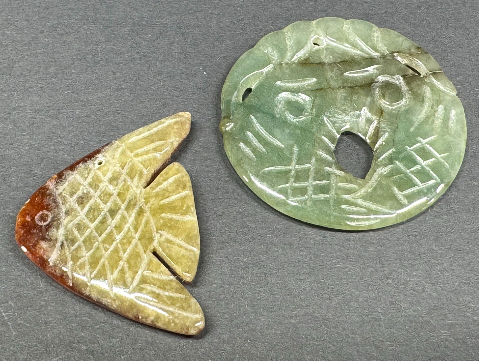 Vintage Chinese carved jade assorted fish pendants. Lot of 2. (1 of 4)