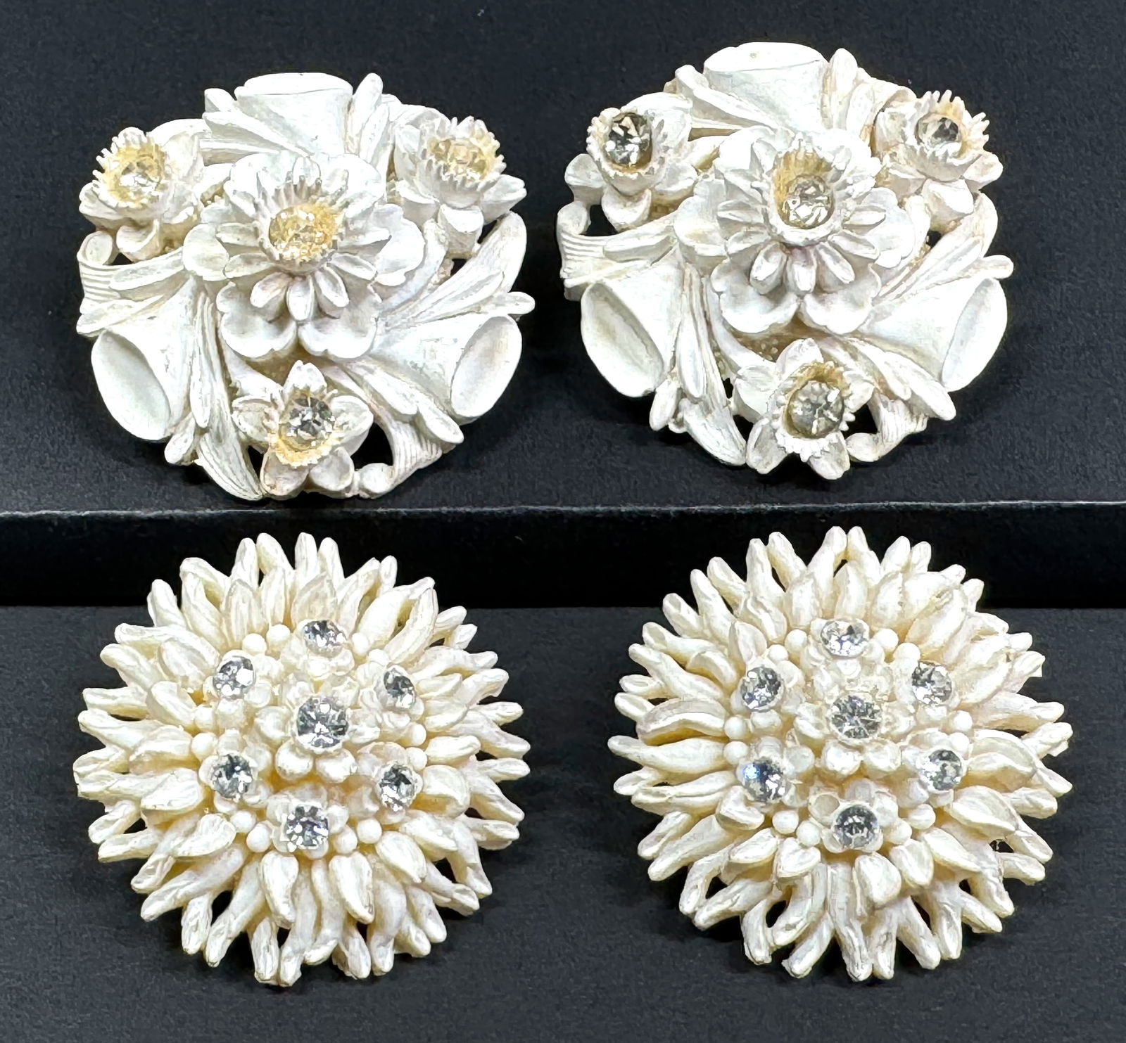 Vintage clear rhinestones off white plastic flower silvertone metal clip earrings.  Lot of 2 (1 of 9)