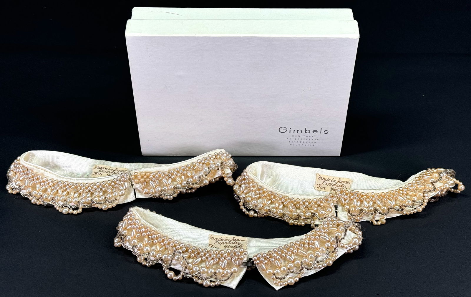 Vintage Japanese Gimbels NY embroidery faux pearls & glass beads creamy silky collar. Lot of 3: Vintage Made in Japan expressly for Gimbels embroidery faux pearls & glass beads creamy silky collars. Lot of 3. Unused in box. Fabric label. They measure around 13 inches long. For other measures ple