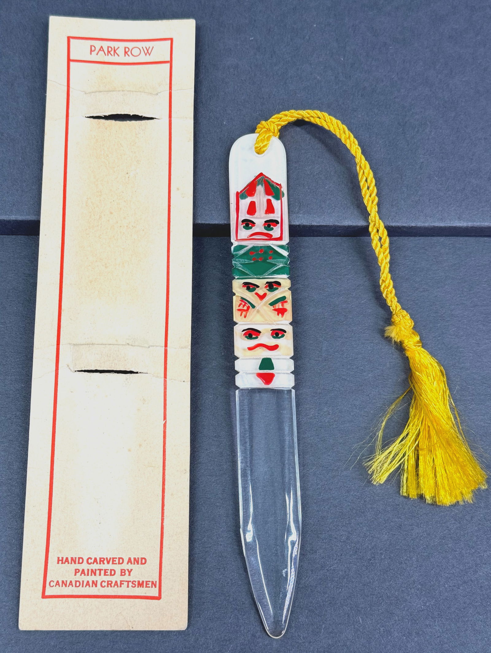 Vintage Canadian carved and painted lucite totem pole letter opener bookmark with tassel (1 of 10)