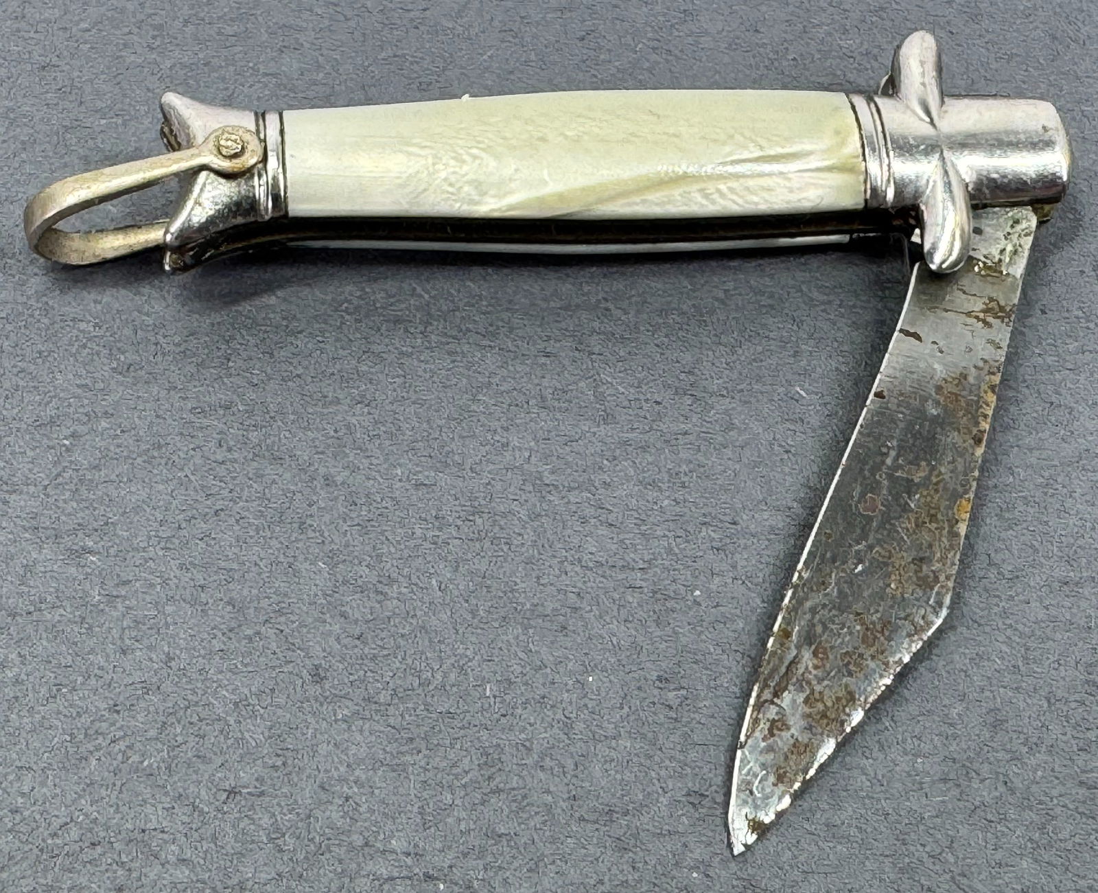 Antique Namomer celluloid inlaid silvertone metal miniature folding pocket knife fob. (1 of 9)