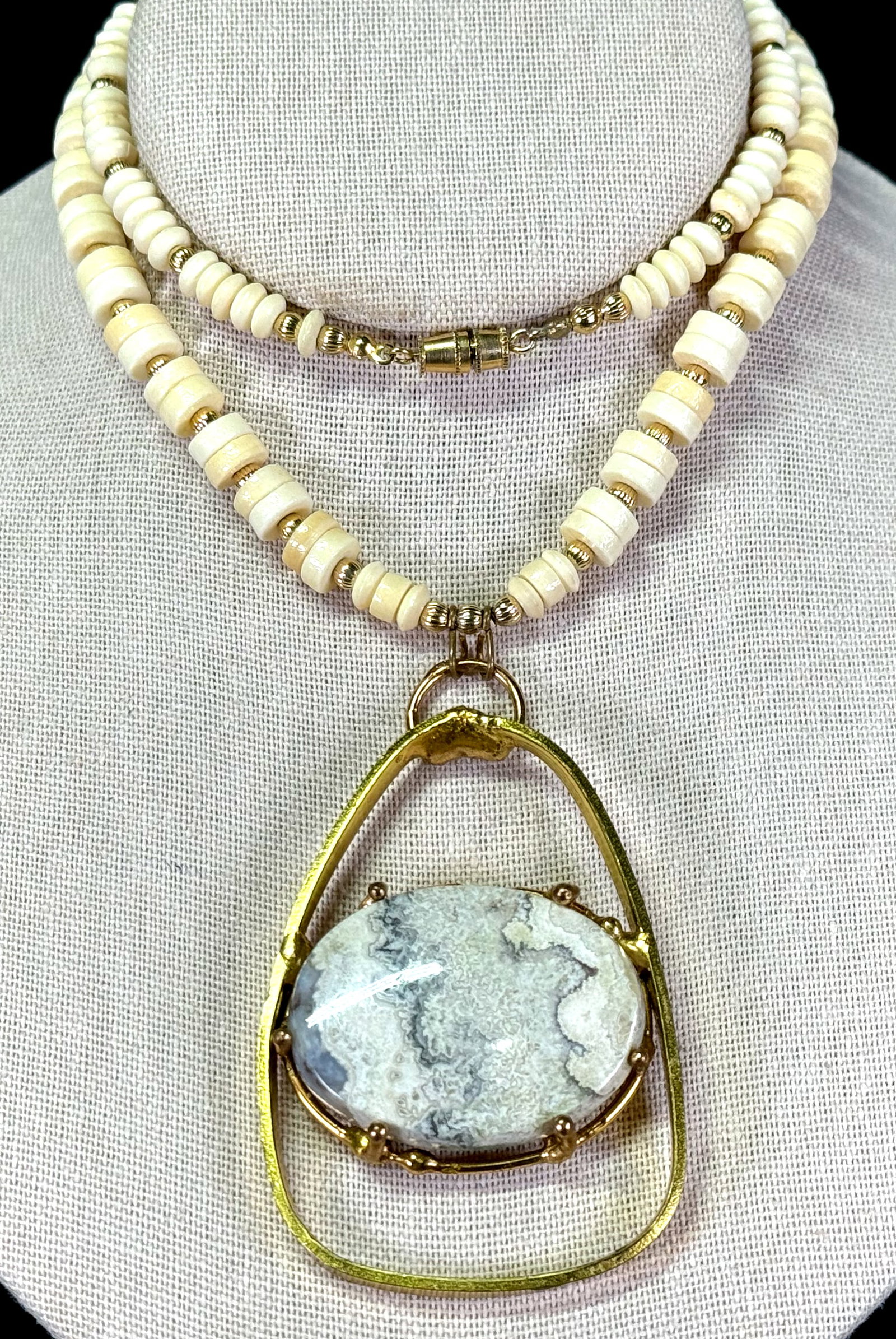 Vintage 80s gray stone goldtone metal medallion bone beaded straps necklace.: Vintage 80s gray stone goldtone metal medallion bone beaded straps necklace. For measures please refer to the pictures taken with a measuring tape. Weight: 55 Grams. This is a NO RESERVE AUCTION: ther