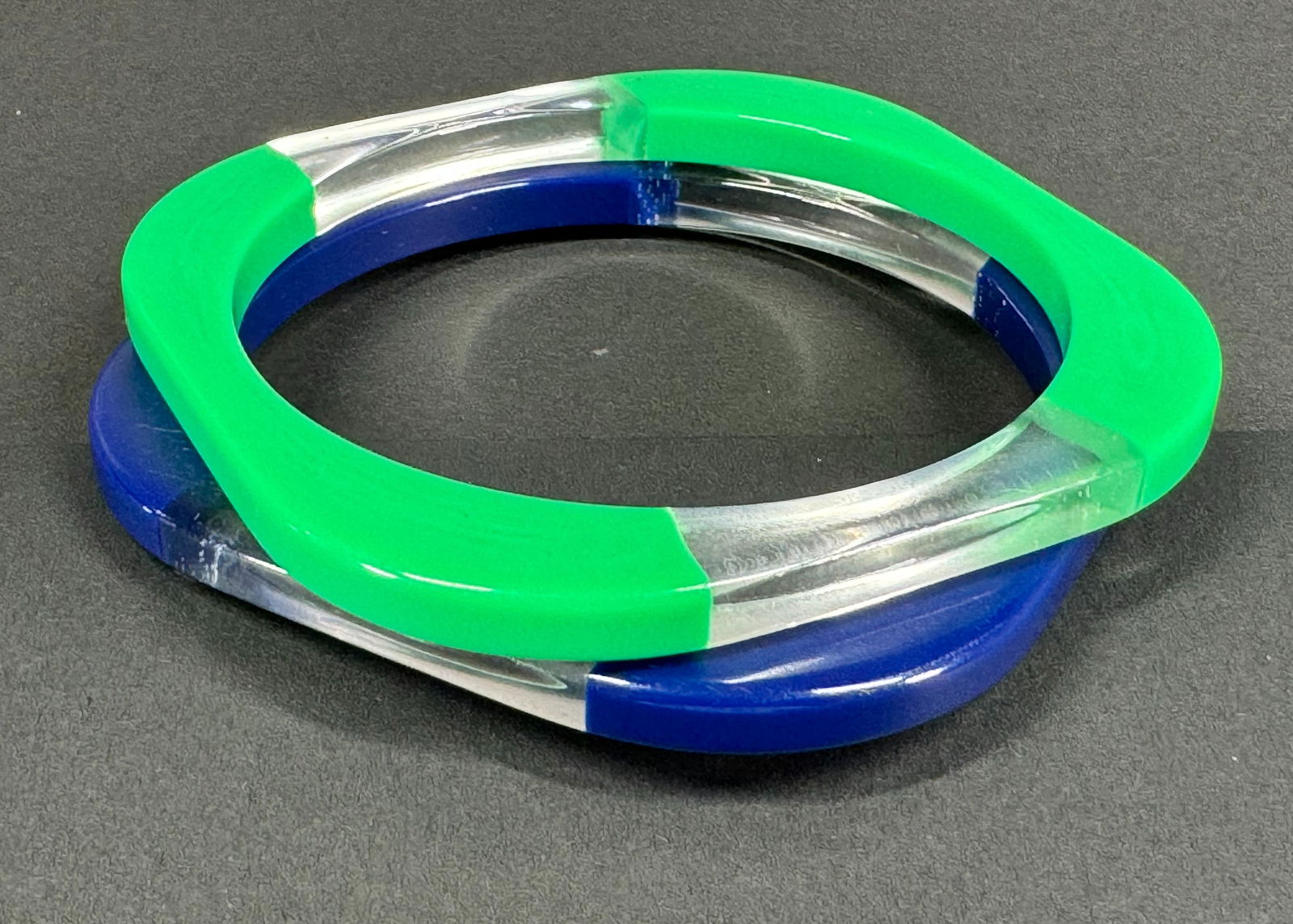 Vintage green & clear and blue & clear square lucite bangle bracelets.: Vintage green & clear and blue & clear square lucite bangle bracelets. For measures please refer to the pictures taken with a measuring tape. Weight: 32 Grams. This is a NO RESERVE AUCTION: there are