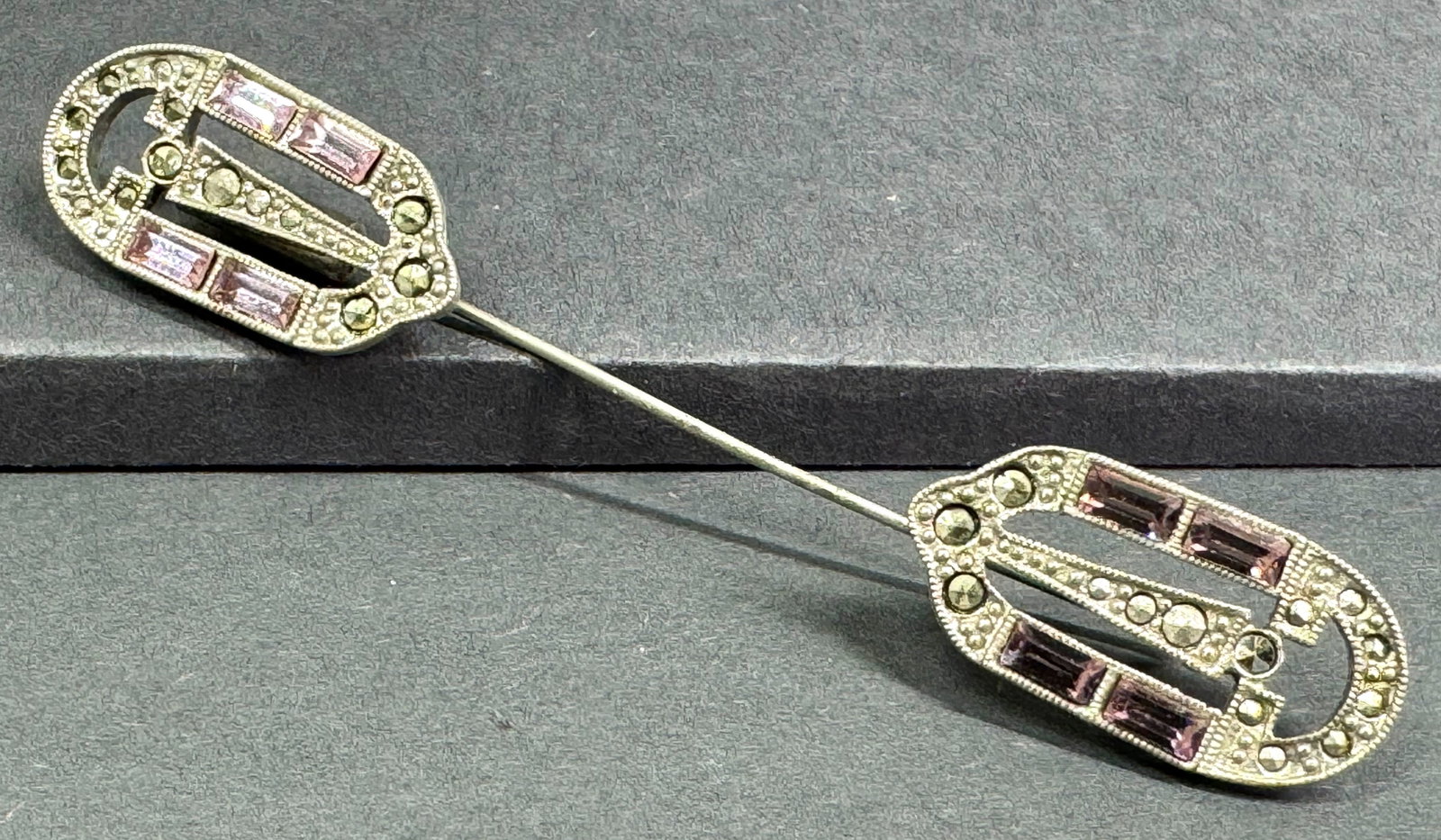 Antique art deco rose crystal & marcasites silvertone pot metal jabot pin .: Antique art deco rose crystal & marcasites silvertone pot metal jabot pin . Unmarked. For measures please refer to the pictures taken with a measuring tape. Weight: 8 Grams. This is a NO RESERVE AUCTI