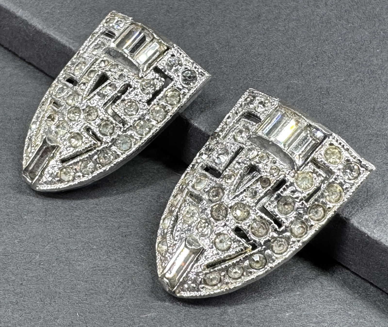 Antique art deco clear crystals silvertone metal clip brooches. PAT 1852188: Antique art deco clear crystals silvertone metal clip brooches. Clips marked PAT. 1852188, a mechanism design by Elias Phinney, granted in 1932, for use on Coro duettes. No mark or signature, only thi
