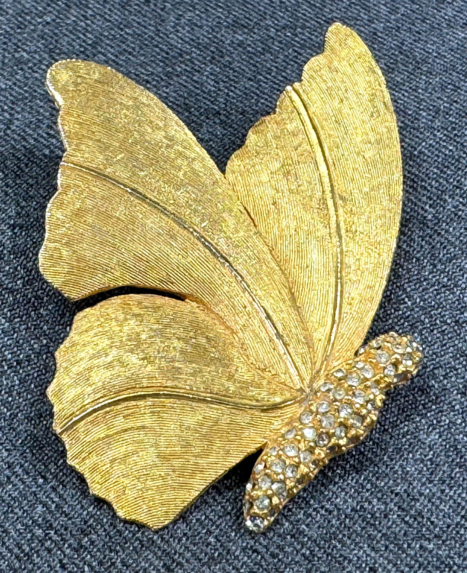 Vintage Hattie Carnegie clear rhinestones brushed goldtone metal butterfly pin brooch.: Vintage Hattie Carnegie clear rhinestones brushed goldtone metal butterfly pin brooch. Marked. For measures please refer to the pictures taken with a measuring tape. Weight: 28 Grams. This is a NO RES