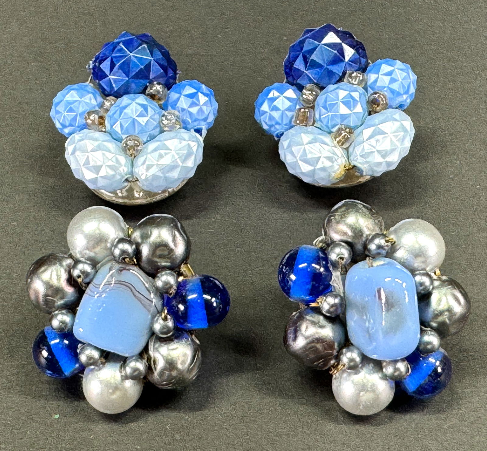 Vintage bluish German plastic & Japanese glass & pearly beaded clip on earrings .: Vintage bluish German plastic & Japanese glass & pearly beaded clip on earrings . Marked. For measures please refer to the pictures taken with a measuring tape. Weight: 25 Grams. This is a NO RESERVE