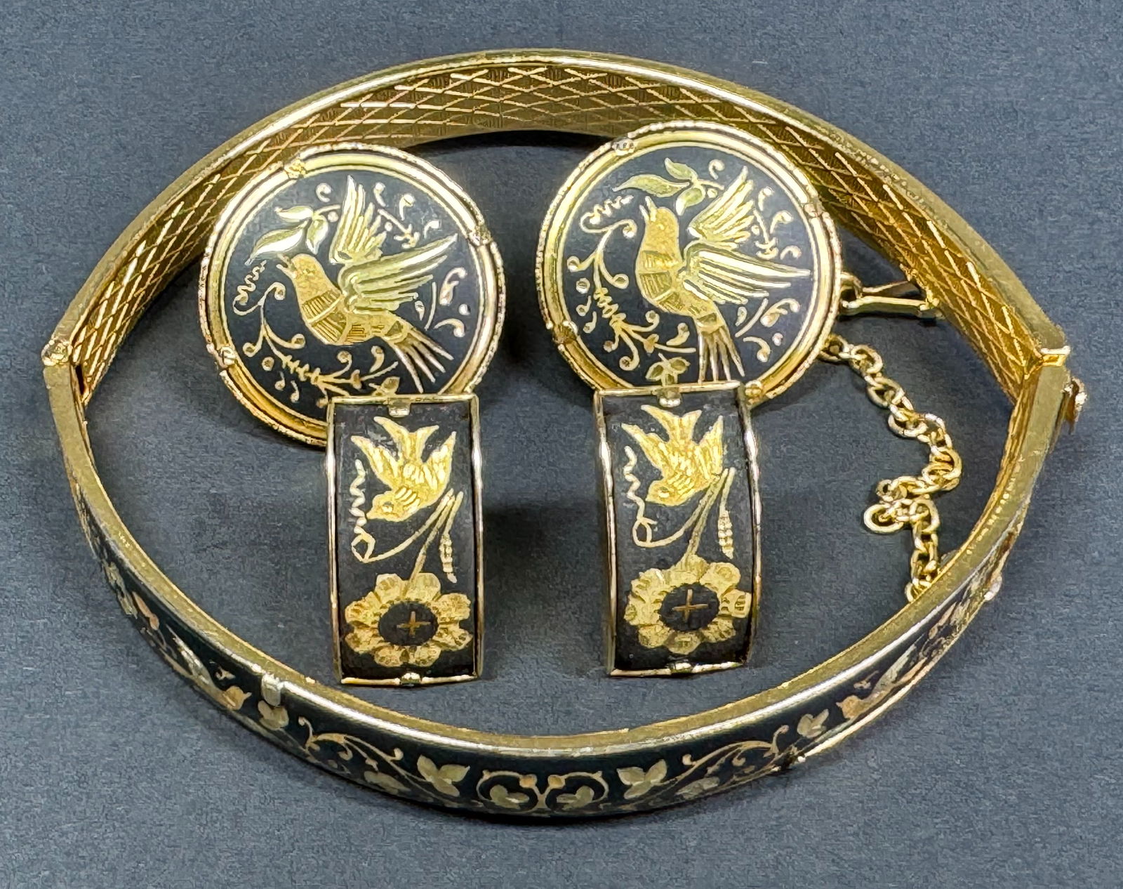 Vintage birds & flowers damascene goldtone metal hinged bracelet and two pairs stud earrings. (1 of 15)