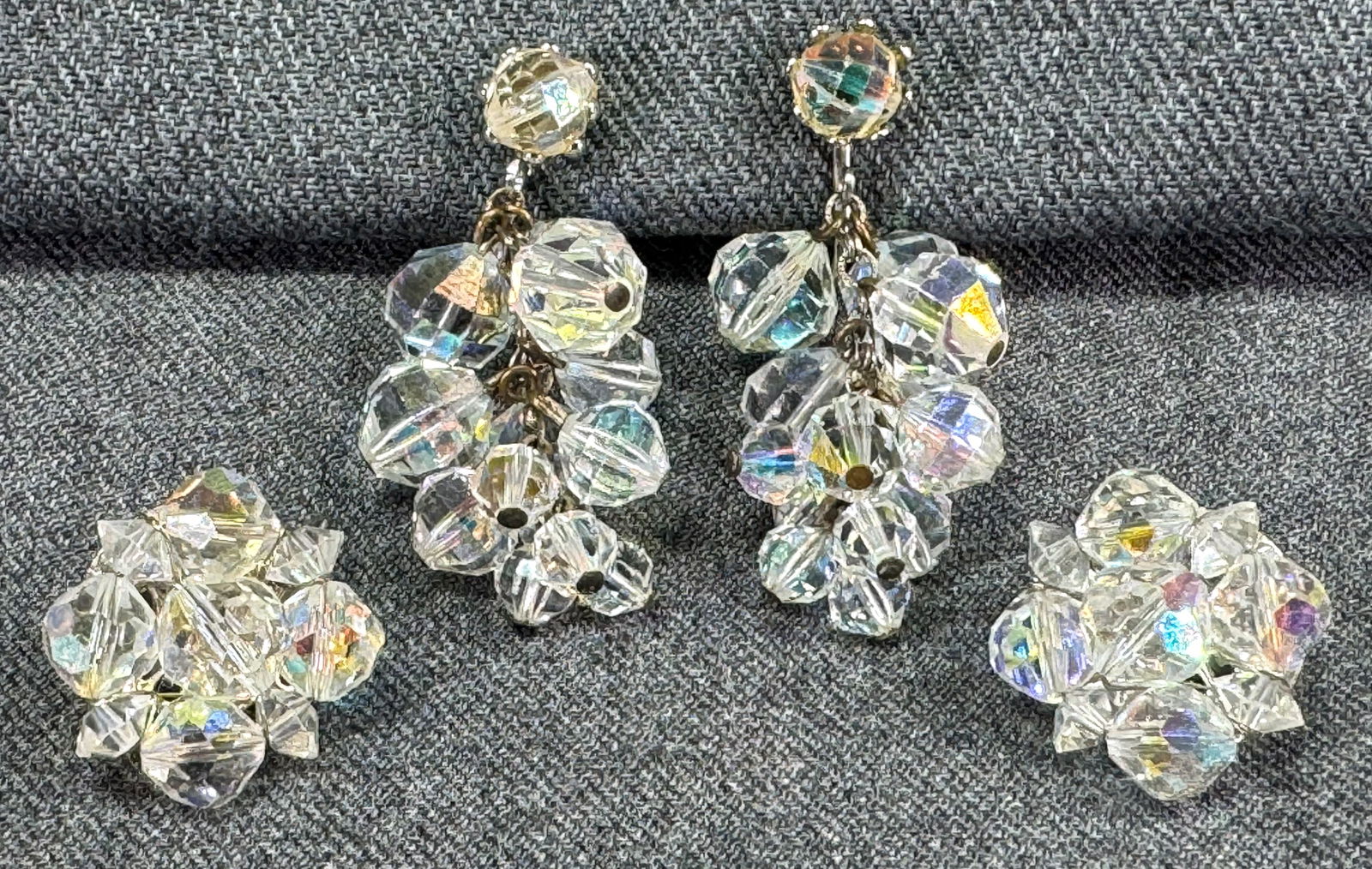 Vintage AB clear crystals Coro flower & unbranded waterfall silvertone metal clip earrings.: Vintage assorted AB clear crystals Coro flower & unbranded waterfall silvertone metal clip earrings. The flowers are marked Coro, the waterfalls are unmarked. For measures please refer to the pictures