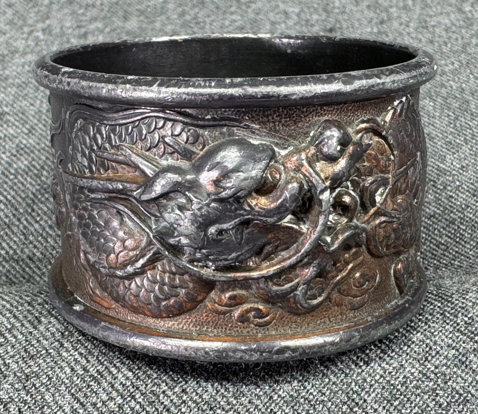 Vintage Chinese cast iron dragons napkin ring.: Vintage Chinese cast iron dragons napkin ring. For measures please refer to the pictures taken with a measuring tape. Weight: 72 Grams. This is a NO RESERVE AUCTION: there are no hidden or confidentia