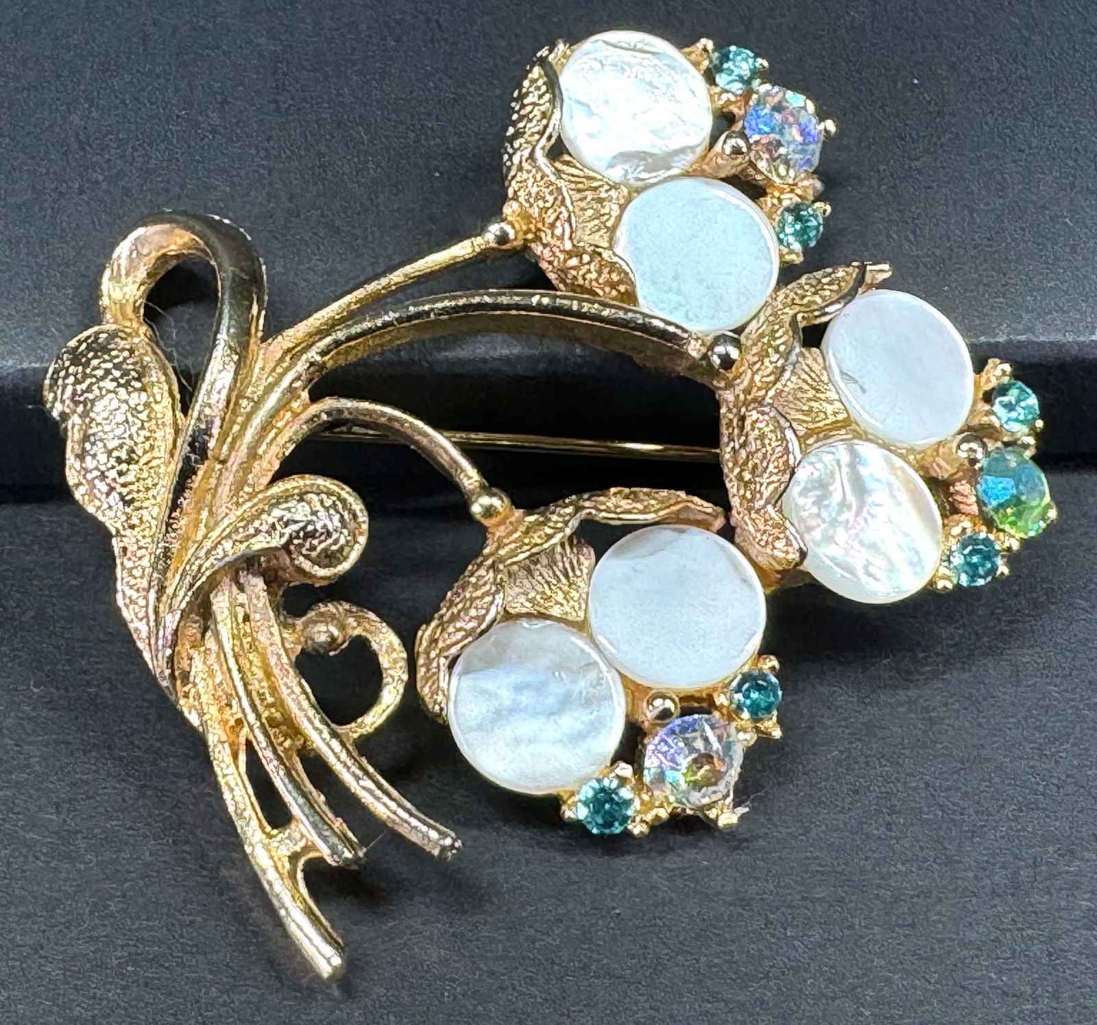 Vintage AB crystals MOP dots goldtone metal flowers bouquet pin brooch.: Vintage AB crystals MOP dots goldtone metal flowers bouquet pin brooch. Unmarked. For measures please refer to the pictures taken with a measuring tape. Weight: 14 Grams. This is a NO RESERVE AUCTION: