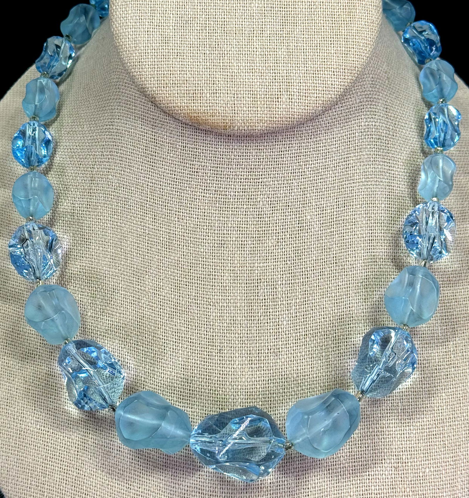 Vintage frosted and clear sky blue lucite beaded necklace.: Vintage frosted and clear sky blue lucite beaded necklace. For measures please refer to the pictures taken with a measuring tape. Weight: 42 Grams. This is a NO RESERVE AUCTION: there are no hidden or