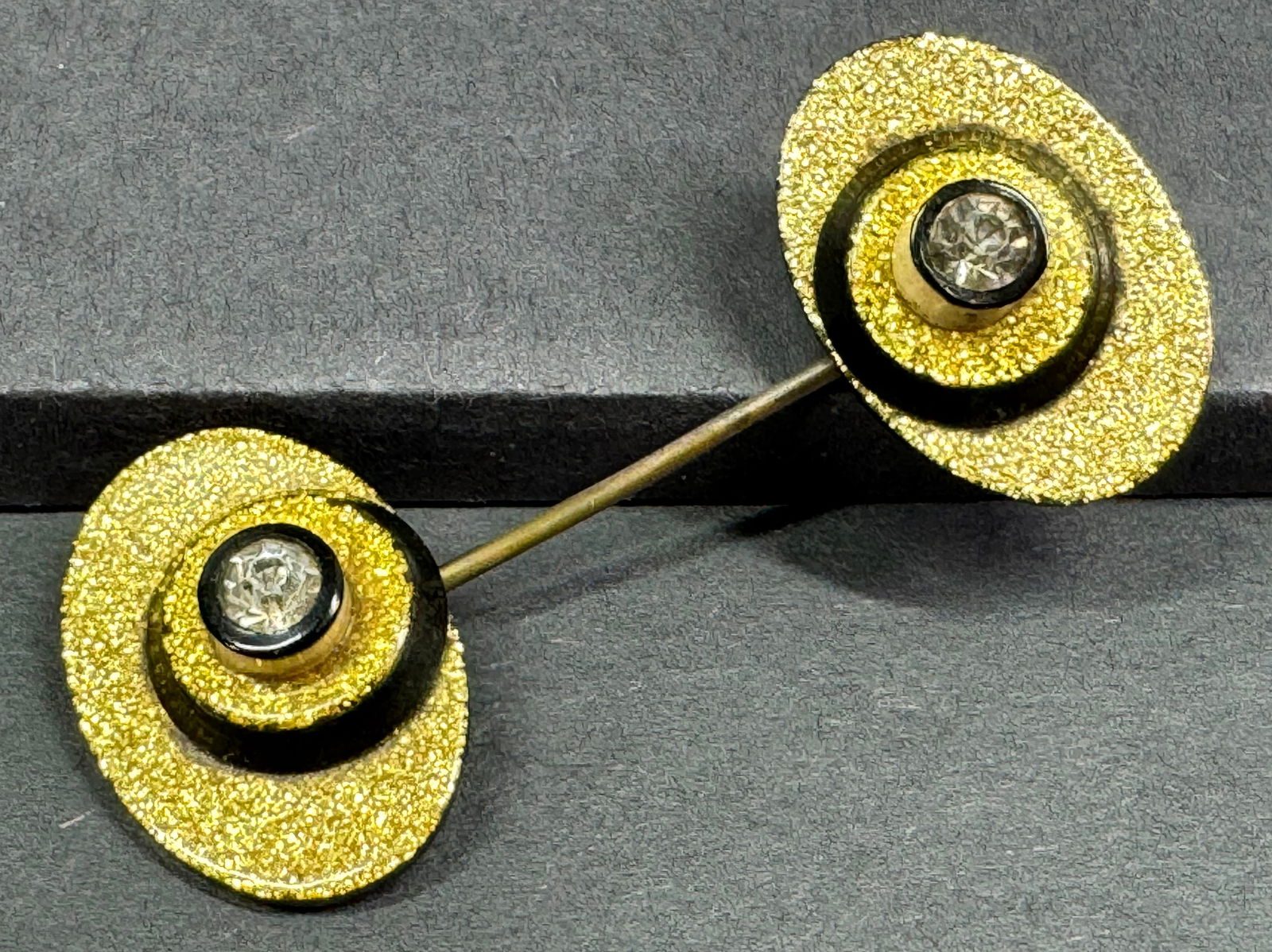 Vintage art deco inlaid clear rhinestones golden glitter and black celluloid jabot pin. (1 of 7)