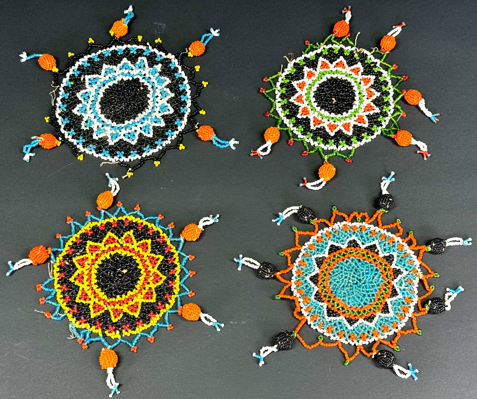 Vintage hand beaded seed glass coasters with tassels for harvest, repair. Lot of 4.: Vintage hand beaded seed glass coasters with tassels for harvest, repair. Lot of 4. For measures please refer to the pictures taken with a measuring tape. Weight: 120 Grams. This is a NO RESERVE AUCTI