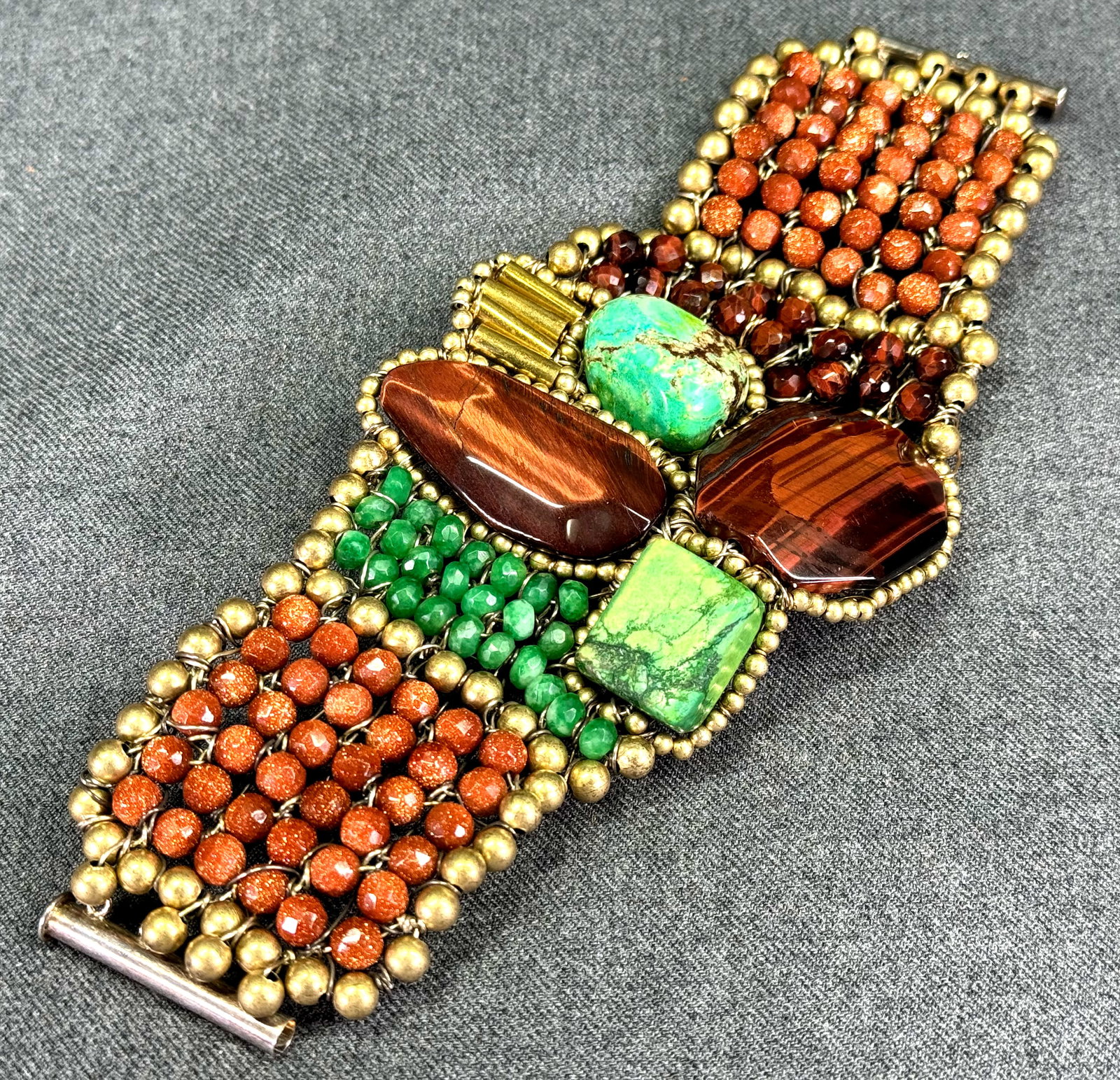 Vintage artsy hand woven turquoise, natural emerald, goldtone & tiger eye stones statement bracelet (1 of 18)