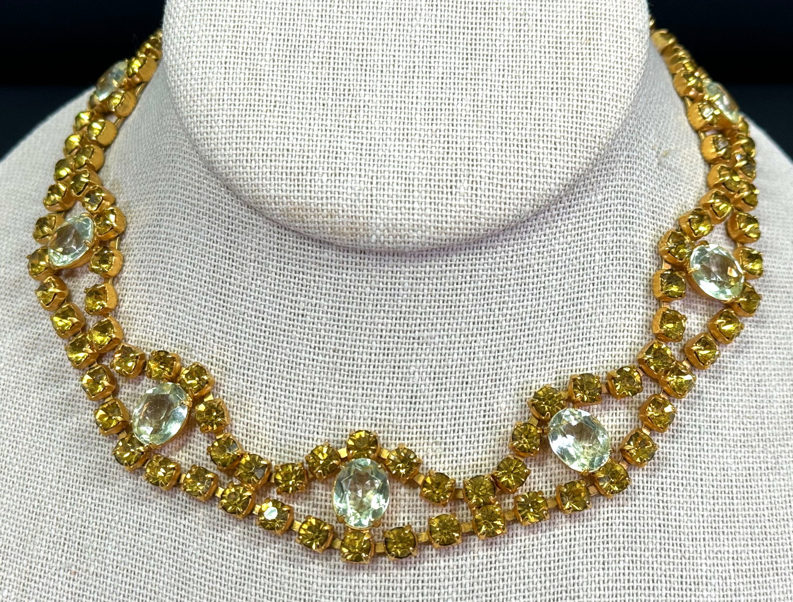 Vintage open back citrine color crystals & golden rhinestones goldtone festoon choker necklace.: Vintage open back citrine color crystals & golden rhinestones goldtone metal festoon choker necklace. Unmarked For measures please refer to the pictures taken with a measuring tape. Weight: 40 Grams. 