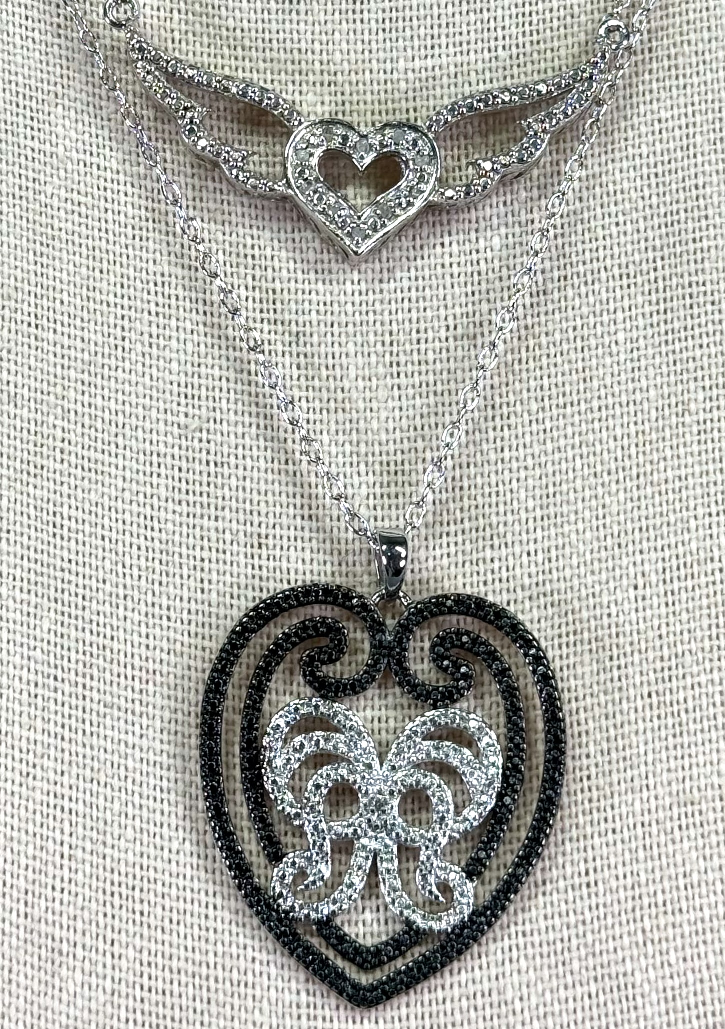 Fas jeweled heart with wings & BB heart collar necklaces.: Fas Thai jeweled heart with wings & BB China heart silvertone collar necklaces. Marked. For measures please refer to the pictures taken with a measuring tape. Weight: 12 Grams. This is a NO RESERVE AU