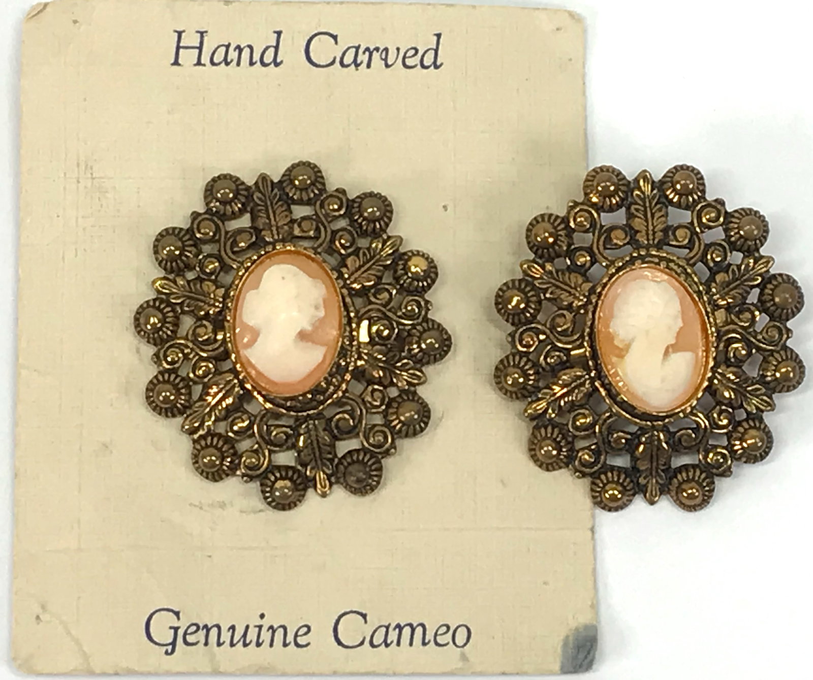 Vintage Shell Cameo Filigree Goldtone Setting Pin Brooches: Vintage Hand Carved Genuine Shell Cameo Filigree Goldtone Metal Setting Pin Brooches. One of them with the original card. For measures please refer to the picture taken with a measuring tape. Weight: 