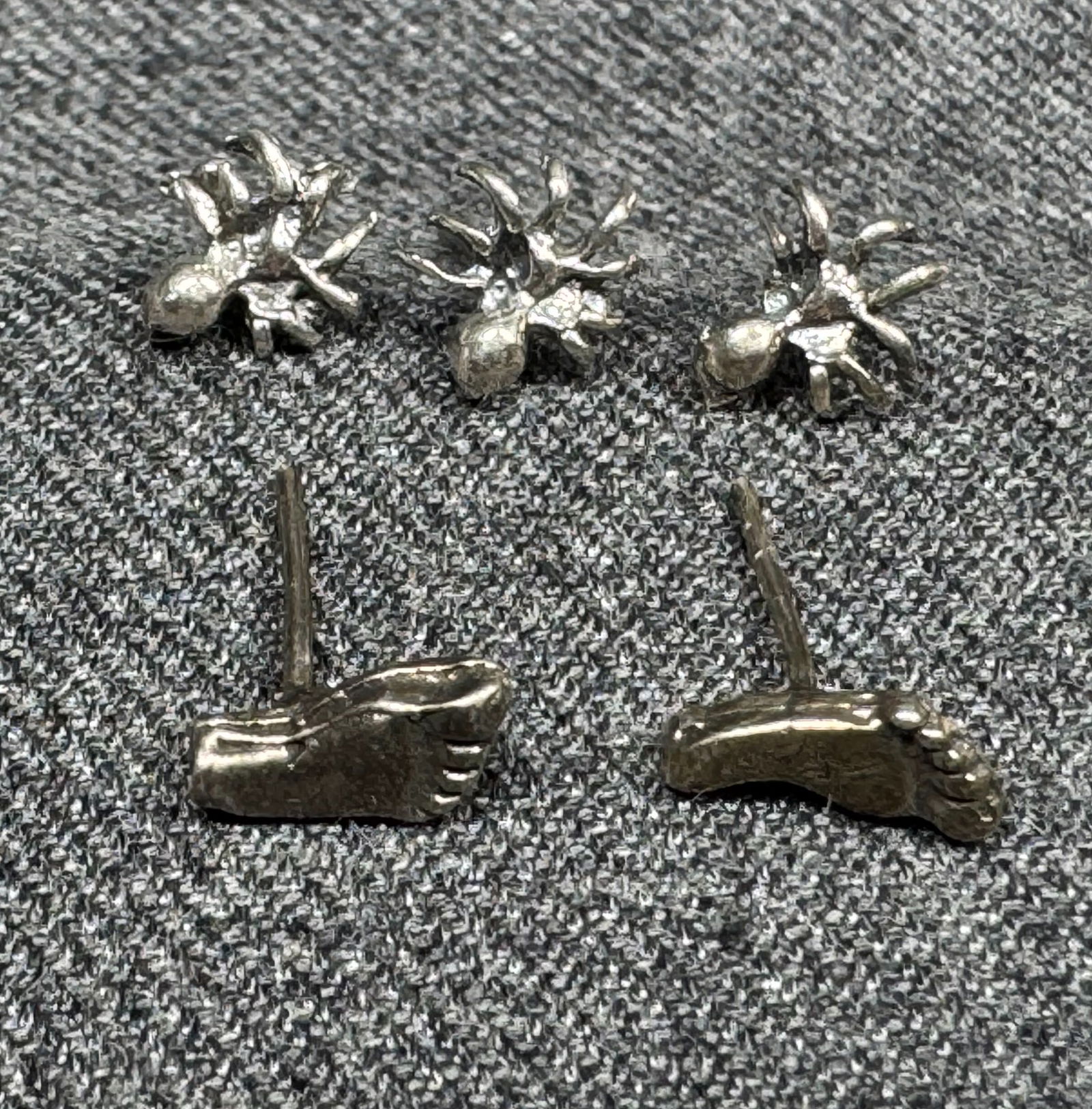 Vintage tiny sterling silver 3 spider & 2 feet stud earrings .: Vintage tiny sterling silver 3 spider & 2 feet stud earrings .5 studs in total . Unmarked. For measures please refer to the pictures taken with a measuring tape. Weight: 1.76 Grams This is a NO RESERV