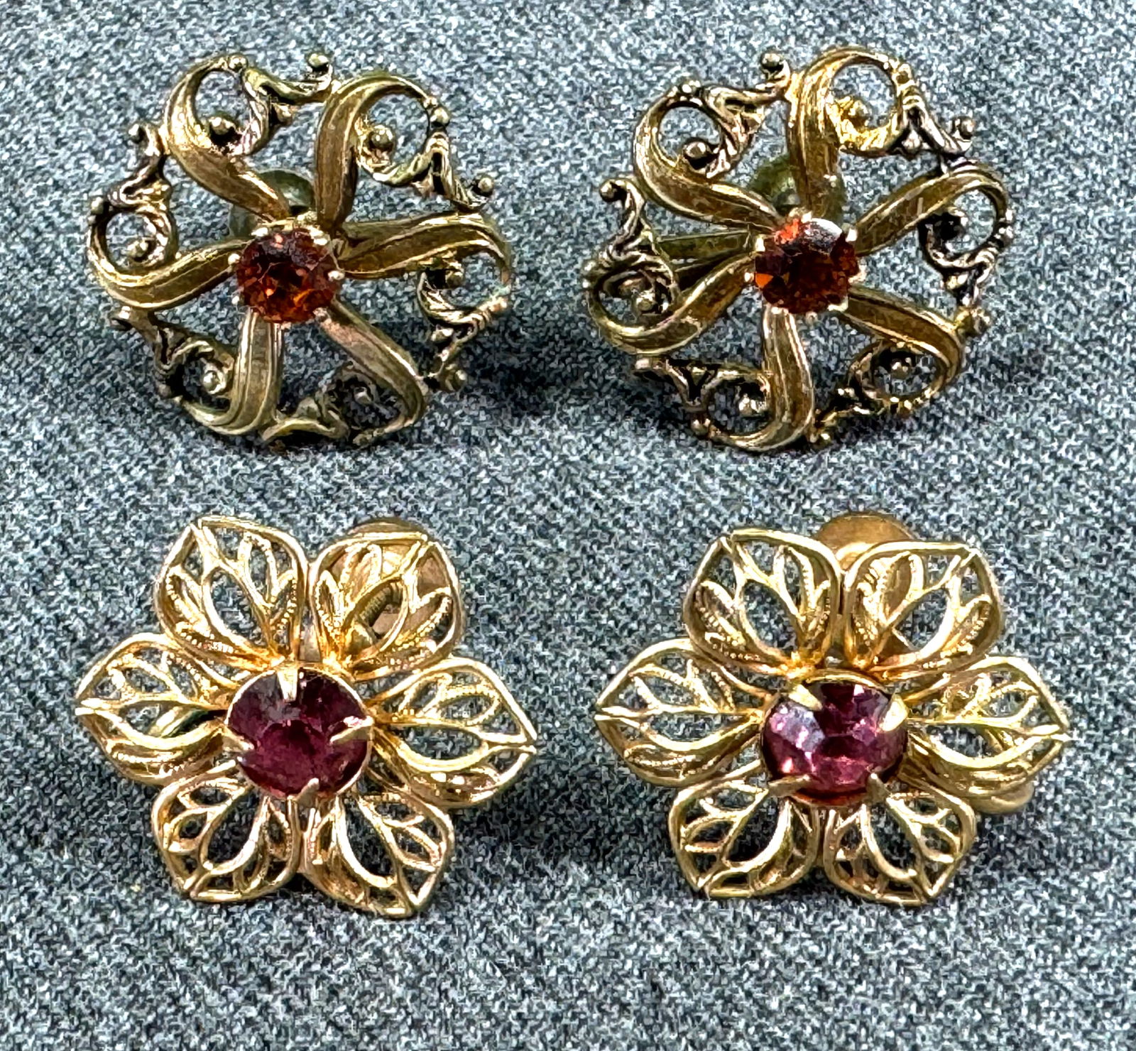 Vintage crystal filigree goldtone flower Coro + unbranded screw back earrings: Vintage crystal filigree goldtone flower Coro + unbranded screw back earrings. One pair is marked Coro and the other one is unmarked. For measures please refer to the pictures taken with a measuring t