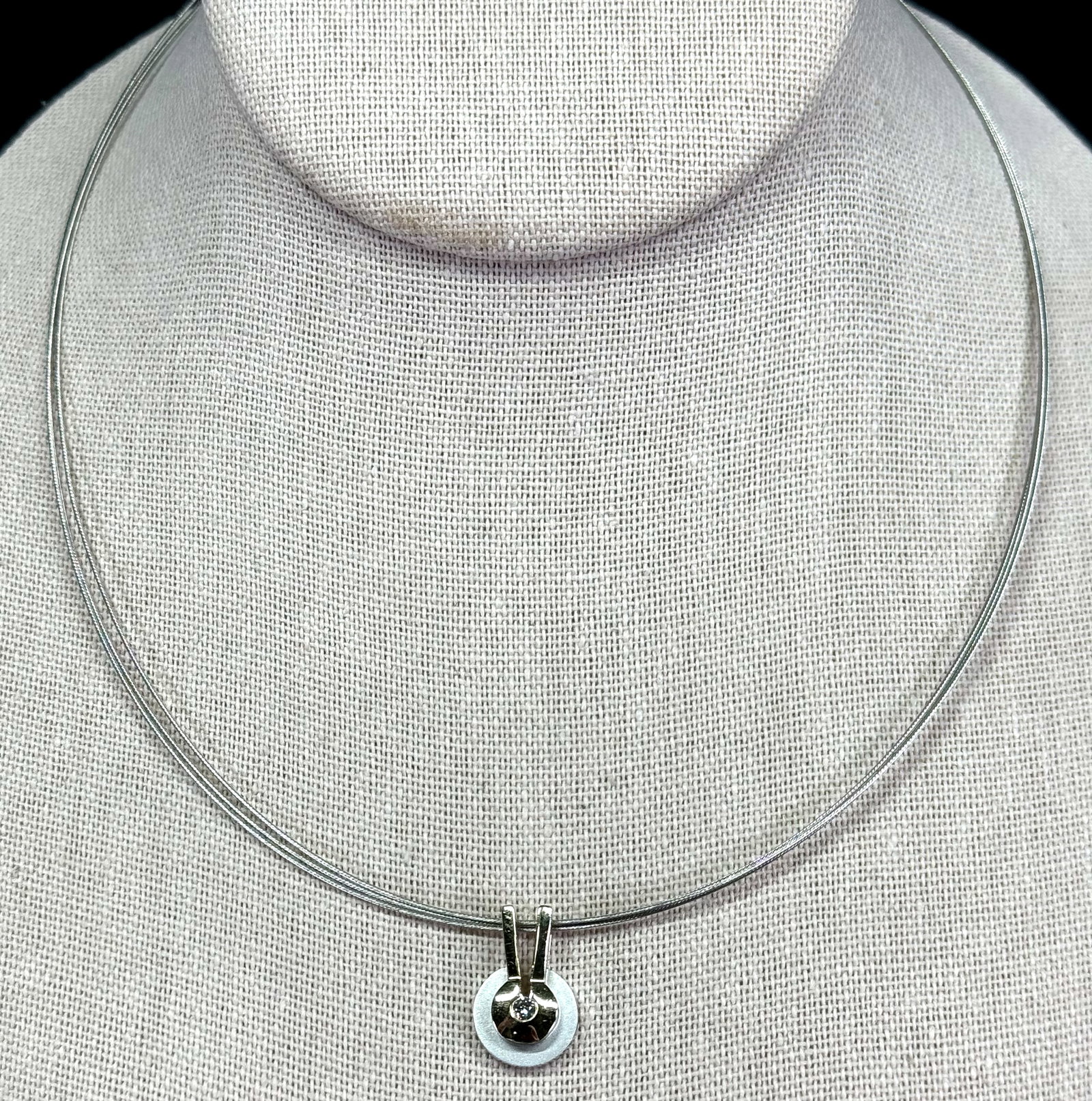 Vintage 80s 14K yellow & white gold diamond pendant with cable straps choker necklace.: Vintage 80s 14K yellow & white gold diamond pendant with cable straps choker necklace. The pendant is marked 585 and an unidentified hallmark and clasp is marked 14K 585 and RG . For measures please r