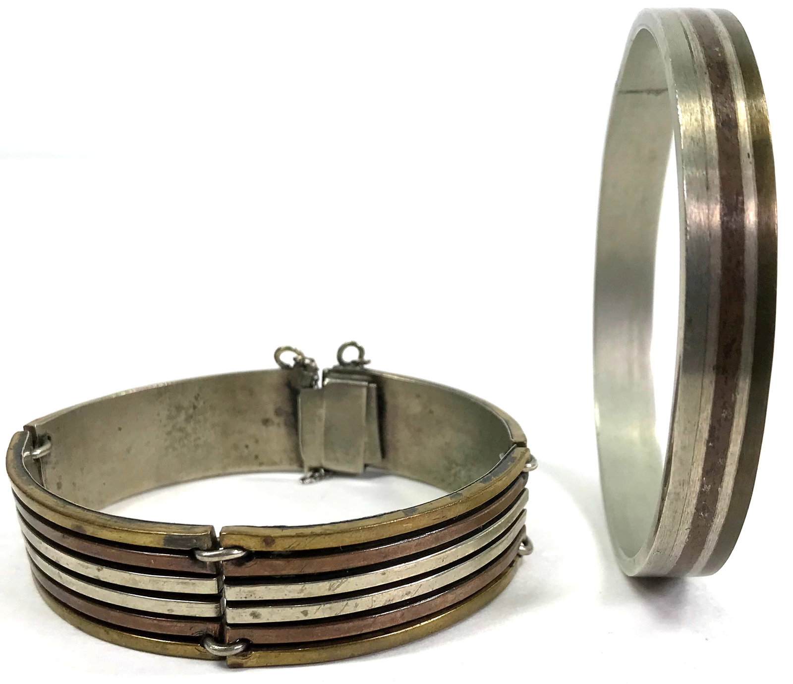 MCM Modernist Metales Casados Mexico Bracelet & Bangle: Vintage MCM Mexican Metales Casados striped bracelets. One has 4 paneles clasp and a security chain. It is unmarked. It measures around 7 inches inside diameter and 5/8 inch wide. It weighs 52 Grams T