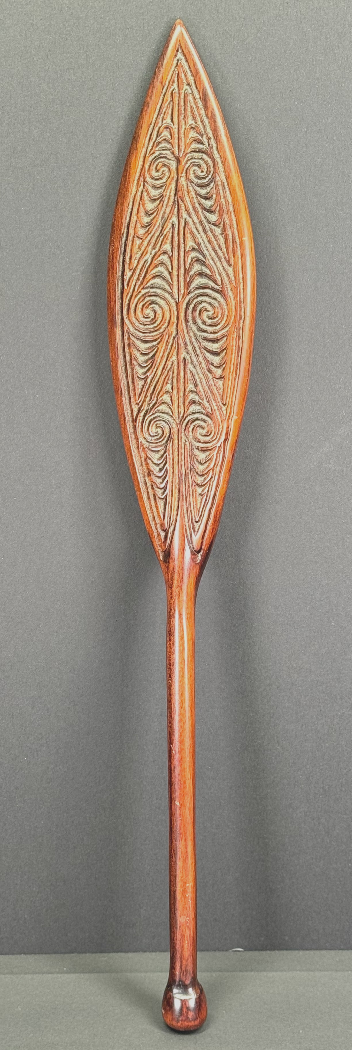 Maori Model of a Paddle. Carved Matai wood.: Maori Model of a Paddle. Carved Matai wood. For measures please refer to the pictures taken with a measuring tape. Weight: Grams. This is a NO RESERVE AUCTION: there are no hidden or confidential rese