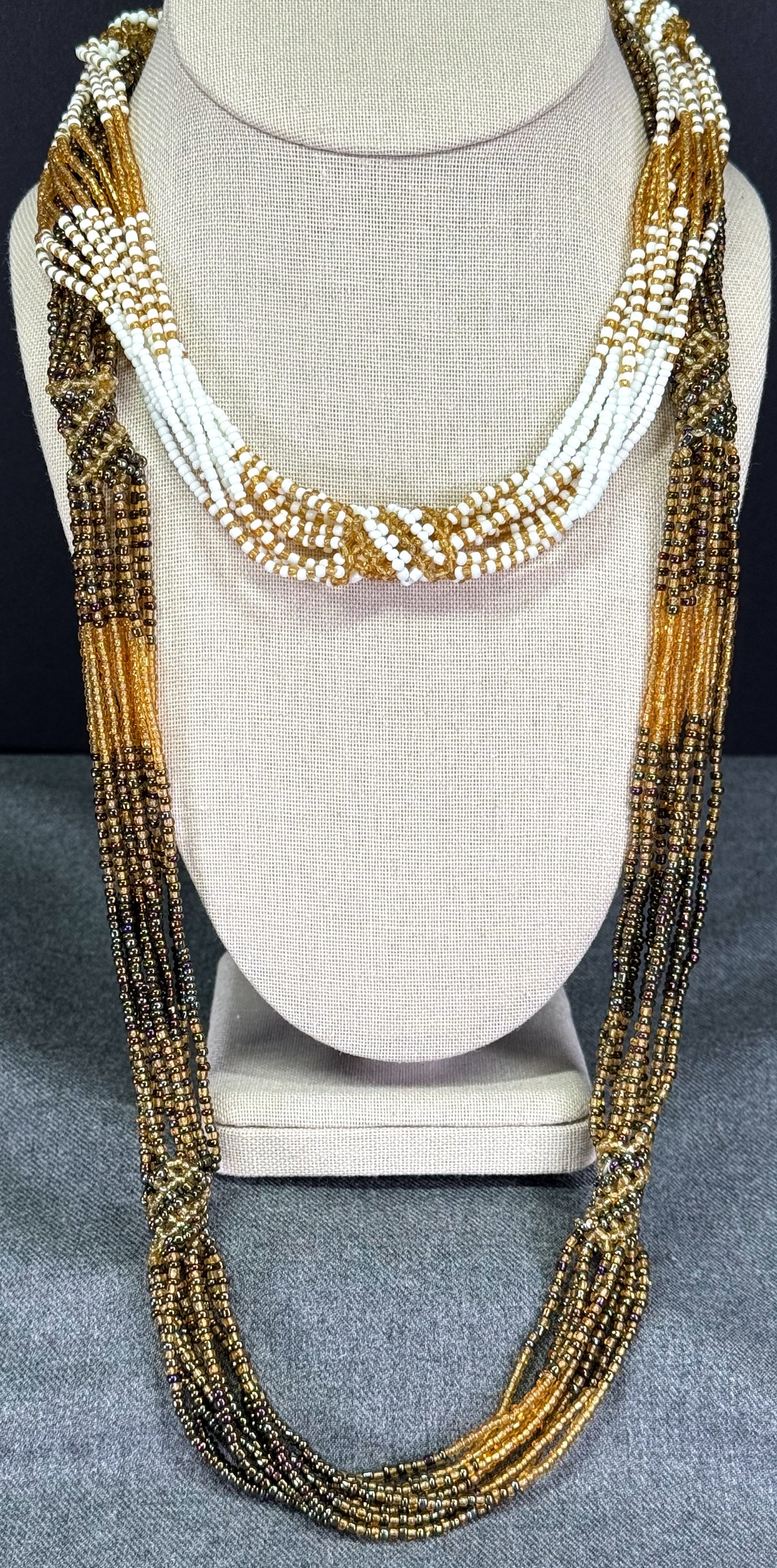 Vintage ethnic style assorted seed glass beaded neckalces. Lot of 2: Vintage ethnic style assorted seed glass beaded neckalces. Lot of 2. Unmarked. For measures please refer to the pictures taken with a measuring tape. Weight: 74 Grams. This is a NO RESERVE AUCTION: th