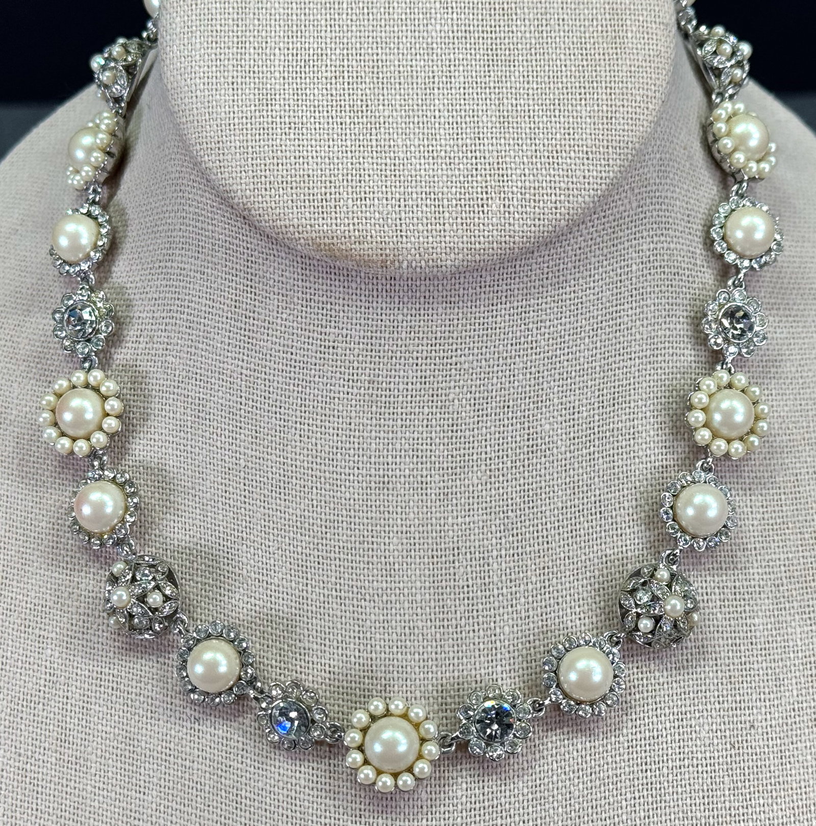 Vintage Carolee pearly beads & rhinestones silvertone metal flowers collar necklace: Vintage Carolee pearly beads & rhinestones silvertone metal flowers collar necklace. Marked. For measures please refer to the pictures taken with a measuring tape. Weight: 50 Grams. This is a NO RESER