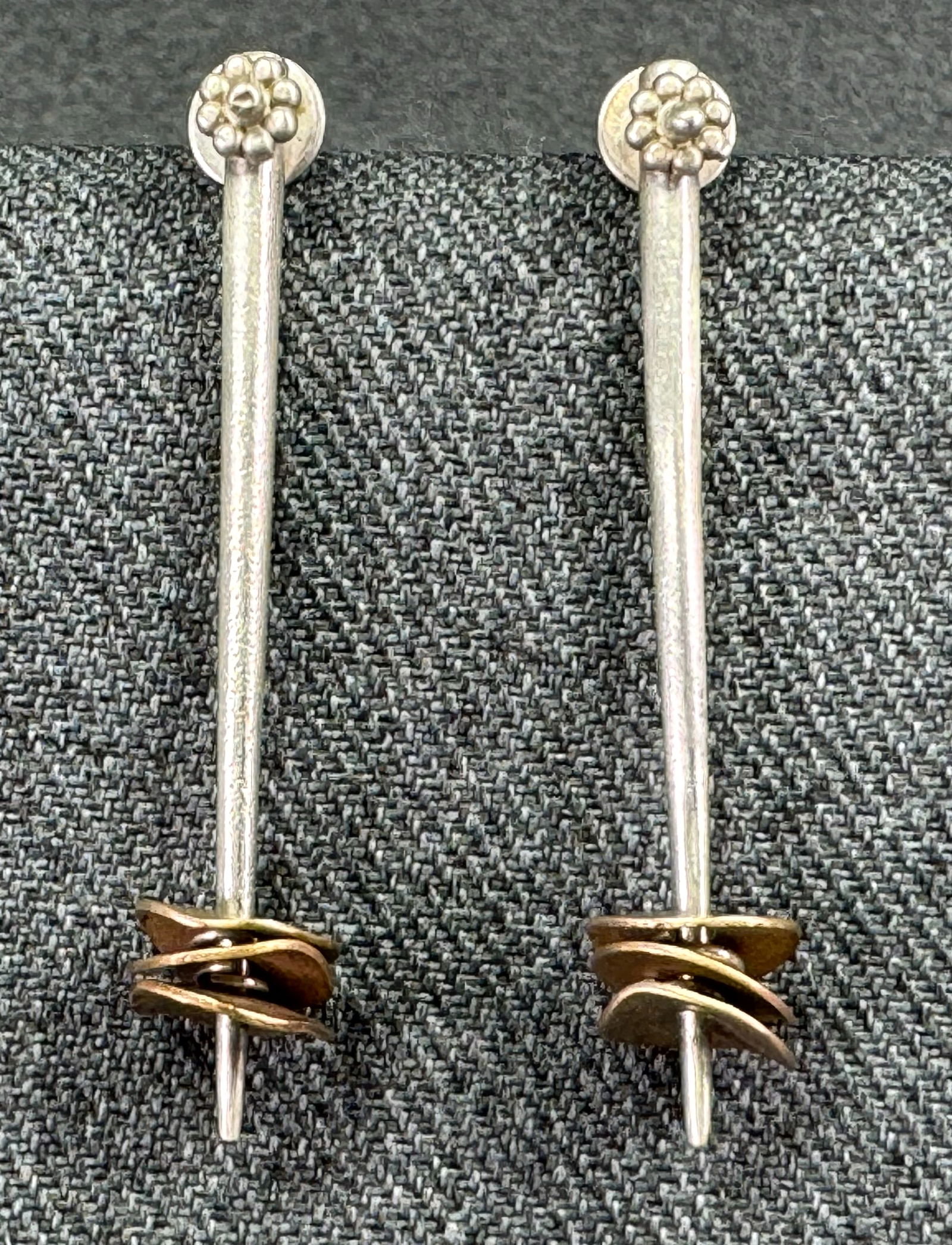 Vintage artsy boho multi metal sliding beads stud earrings.: Vintage artsy boho multi metal sliding beads stud earrings. Push backs are marked 925 and a hallmark. For measures please refer to the pictures taken with a measuring tape. Weight: 6.68 Grams. This is