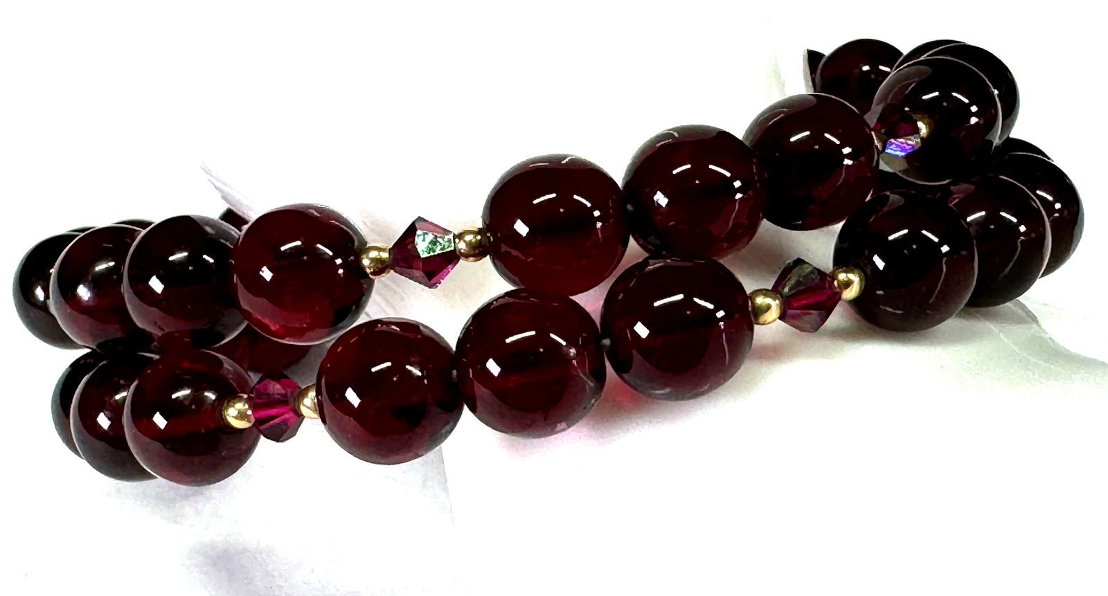 AB ruby color crystals & glass wired beads wrap bracelet.: AB ruby color crystals & glass wired beads wrap bracelet. Ummarked. For measures please refer to the pictures taken with a measuring tape. Weight: 25 Grams. This is a NO RESERVE AUCTION: there are no