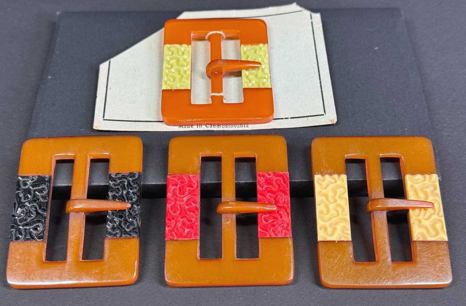 Vintage Czech art deco flapper inlaid color celluloid applejuice bakelite belt buckles Lot of 4. (1 of 9)