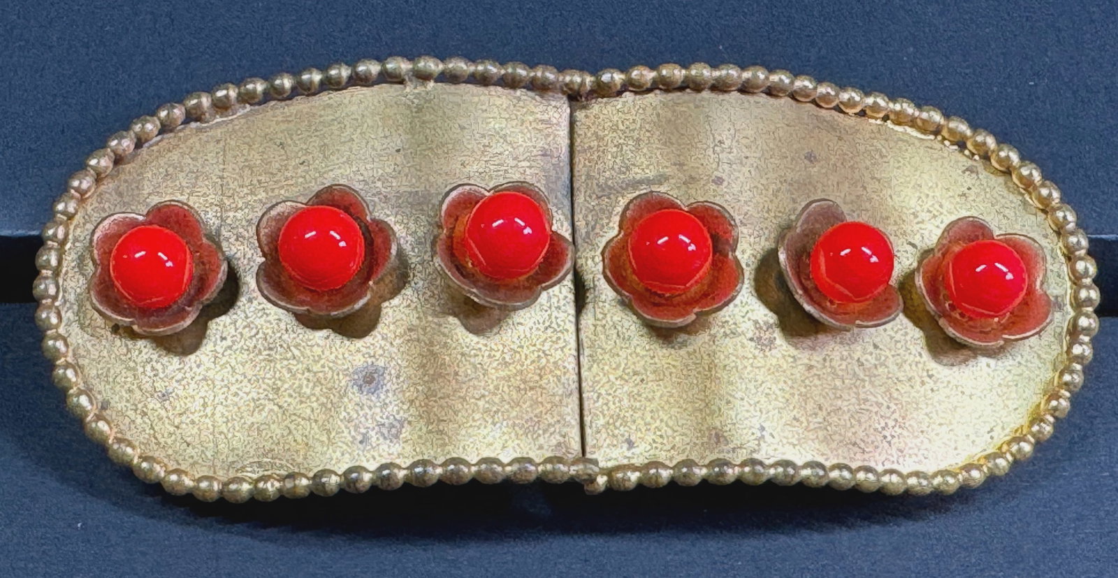 Vintage red glass beads goldtone metal flowers belt buckle.: Vintage red glass beads goldtone metal flowers belt buckle. Unmarked. For measures please refer to the pictures taken with a measuring tape. Weight: 30 Grams. This is a NO RESERVE AUCTION: there are n