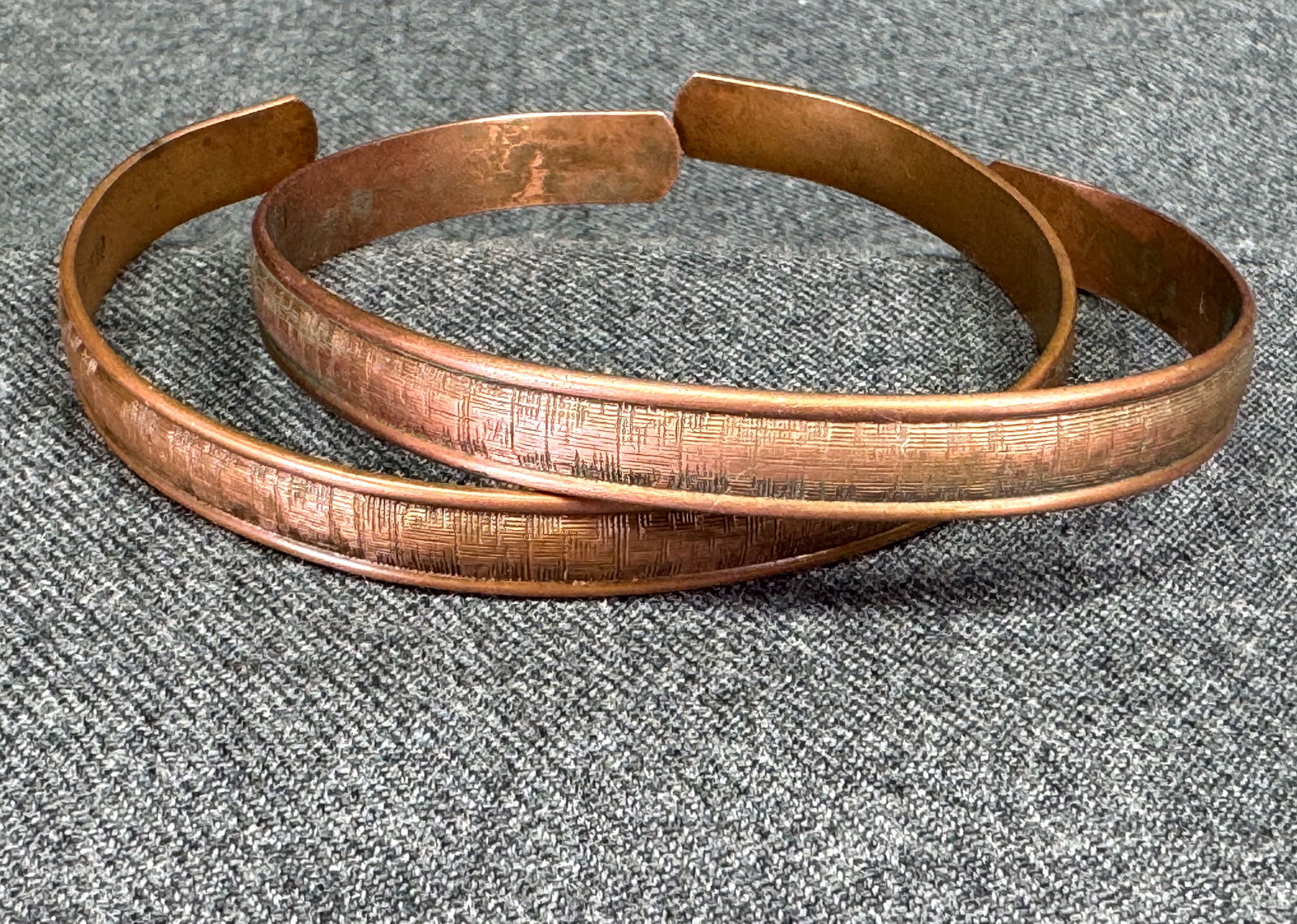 Vintage MCM textured genuine copper cuff bracelets. Lot of 2: Vintage MCM textured genuine copper cuff bracelets. Lot of 2. Marked. For measures please refer to the pictures taken with a measuring tape. Weight: 28 Grams. IN HOUSE Estimated* shipping and handling