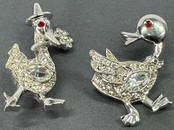 Vintage clear crystal belly rhinestones silvertone metal duck lovers pin brooches.